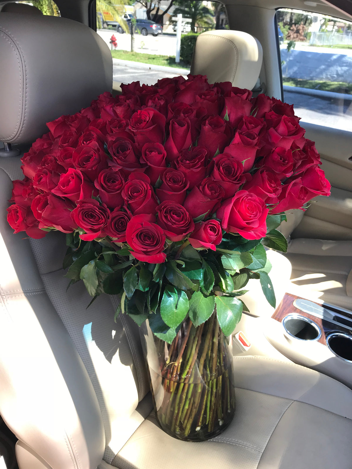 100 Red Roses in a Vase handcrafted by Luxury Flowers Miami