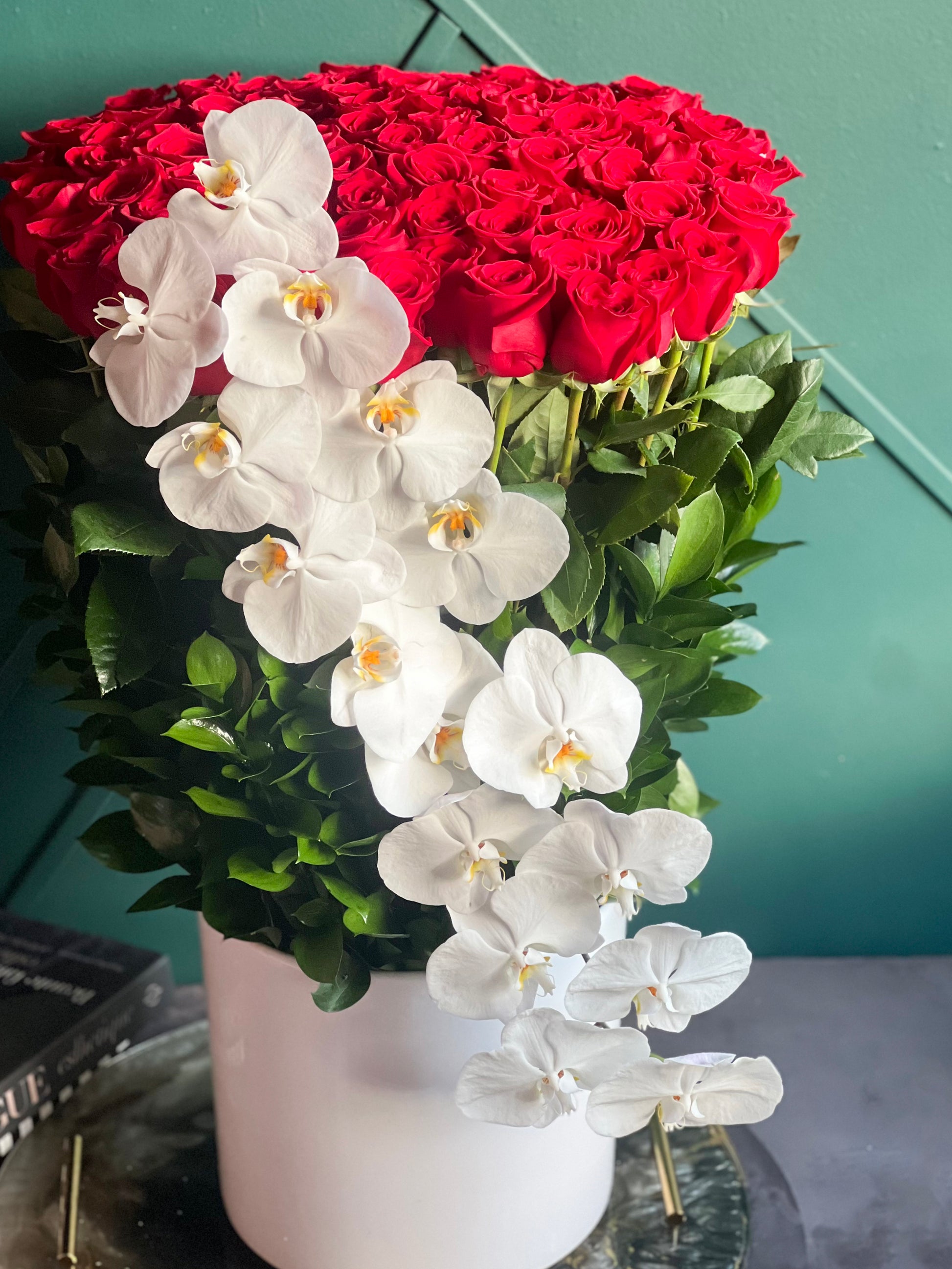 100 extra long red roses with white Phalaenopsis orchids Miami