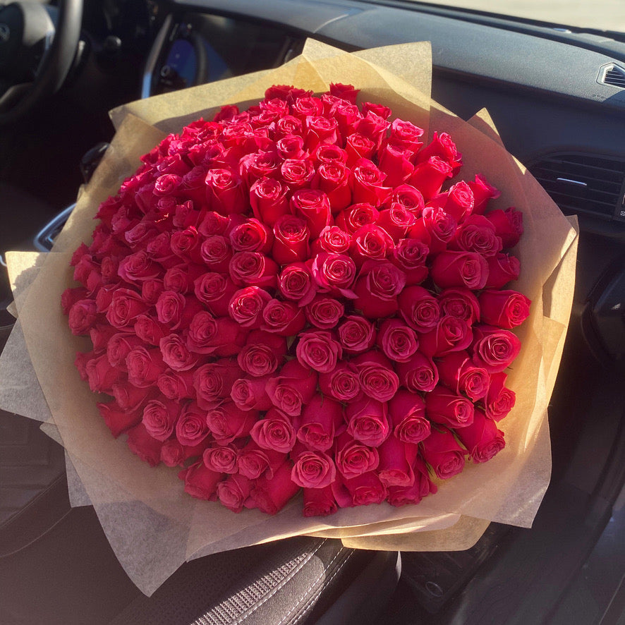 100 hot pink roses bouquet for luxury flower delivery in Miami