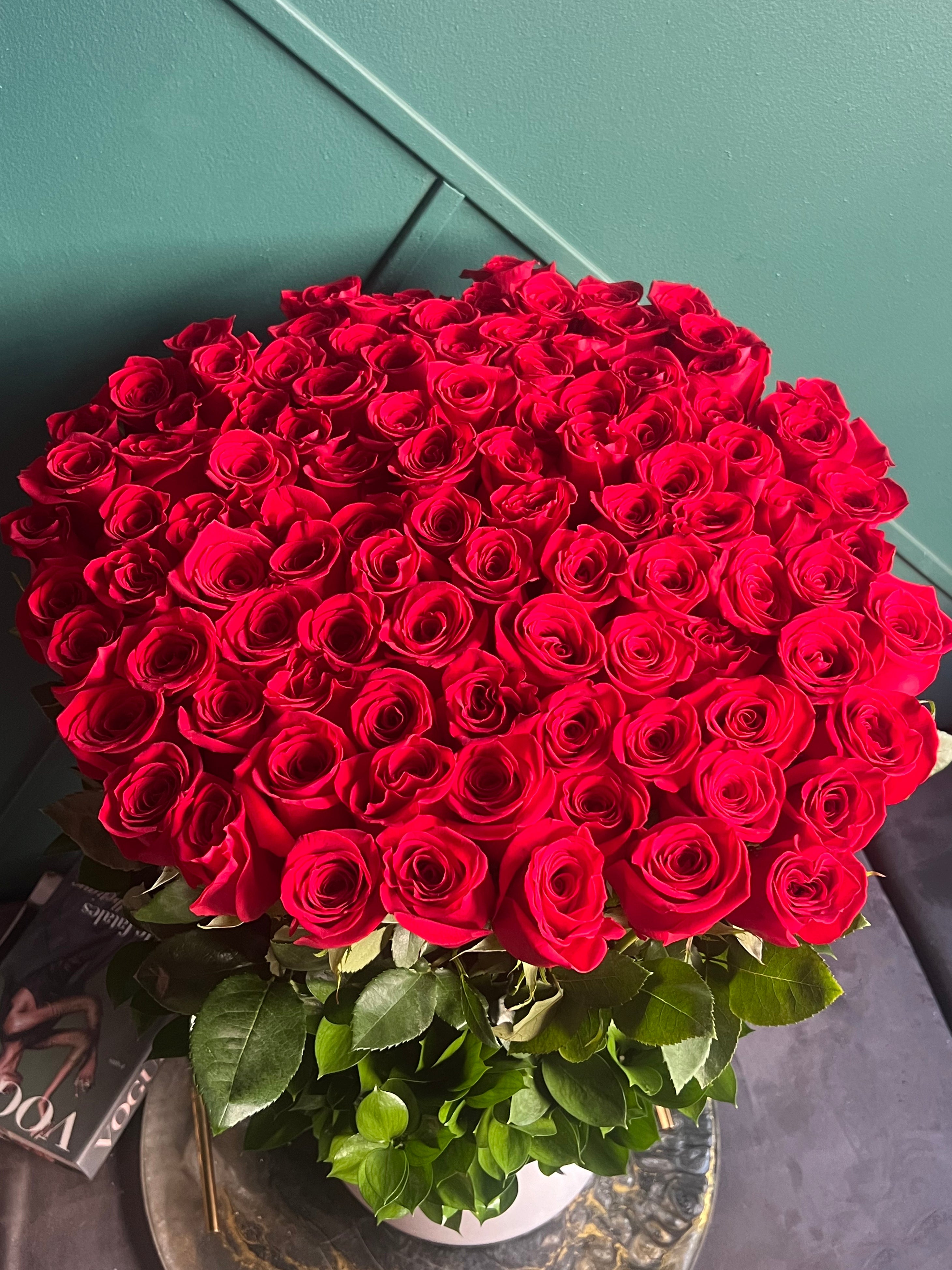 100 long stem red roses Miami luxury flower arrangement