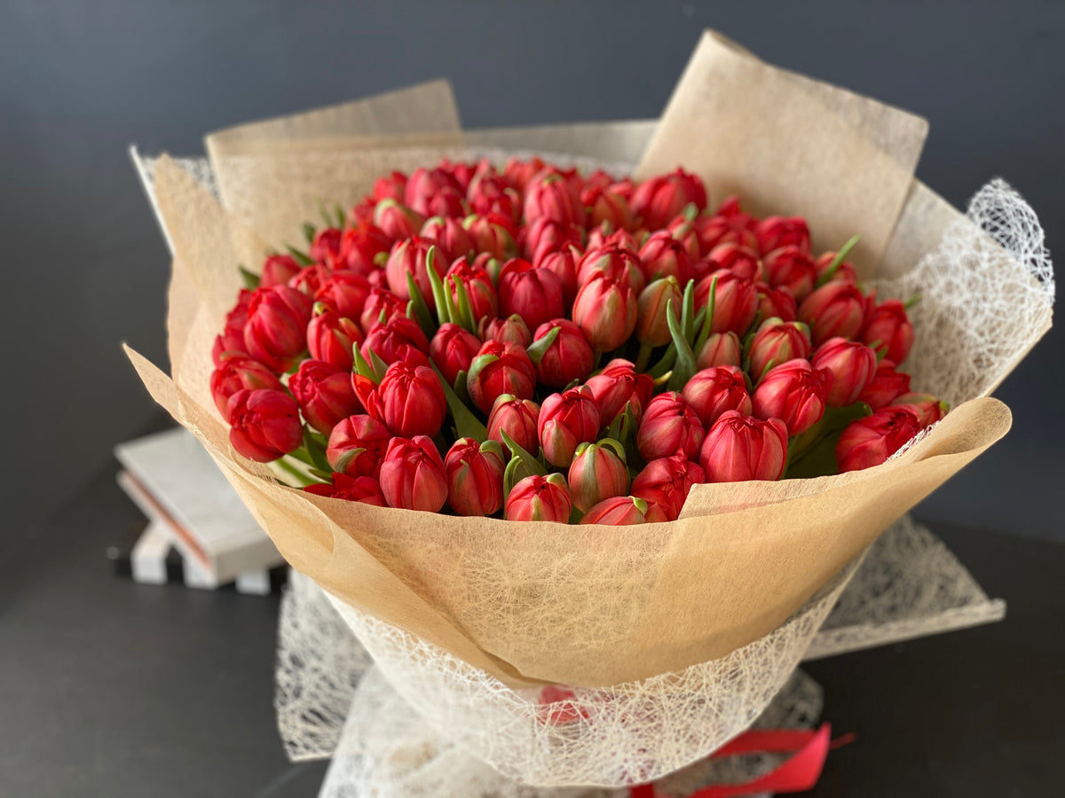 100 red tulips bouquet handcrafted in Miami