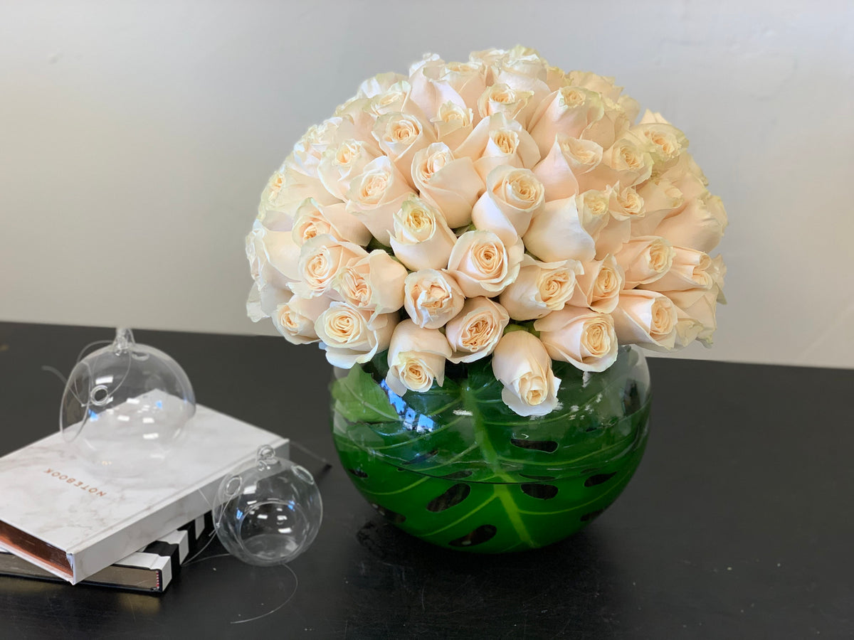 100 white roses arrangement handcrafted in Miami