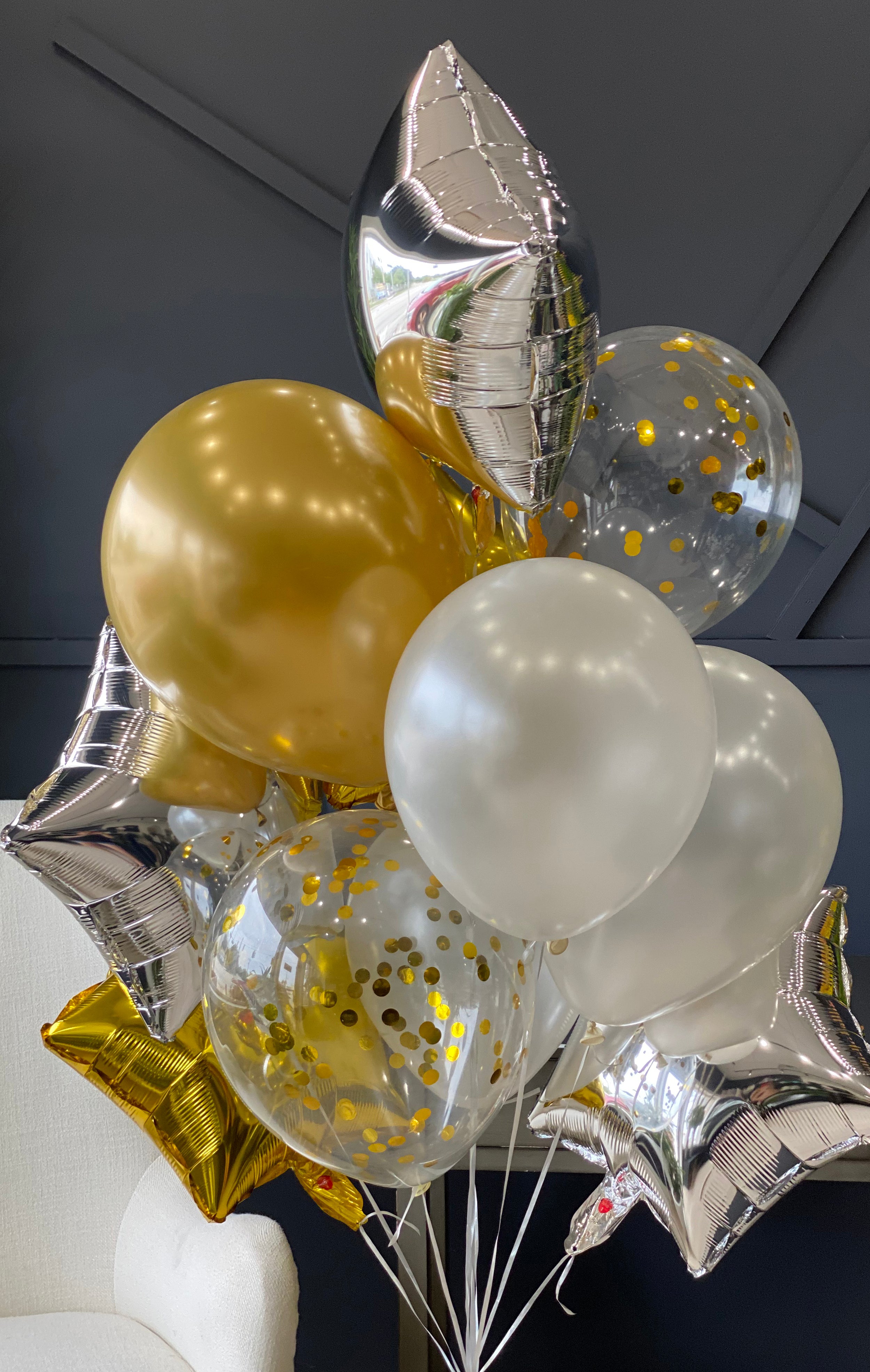 12 foil and latex balloons arranged by Luxury Flowers Miami