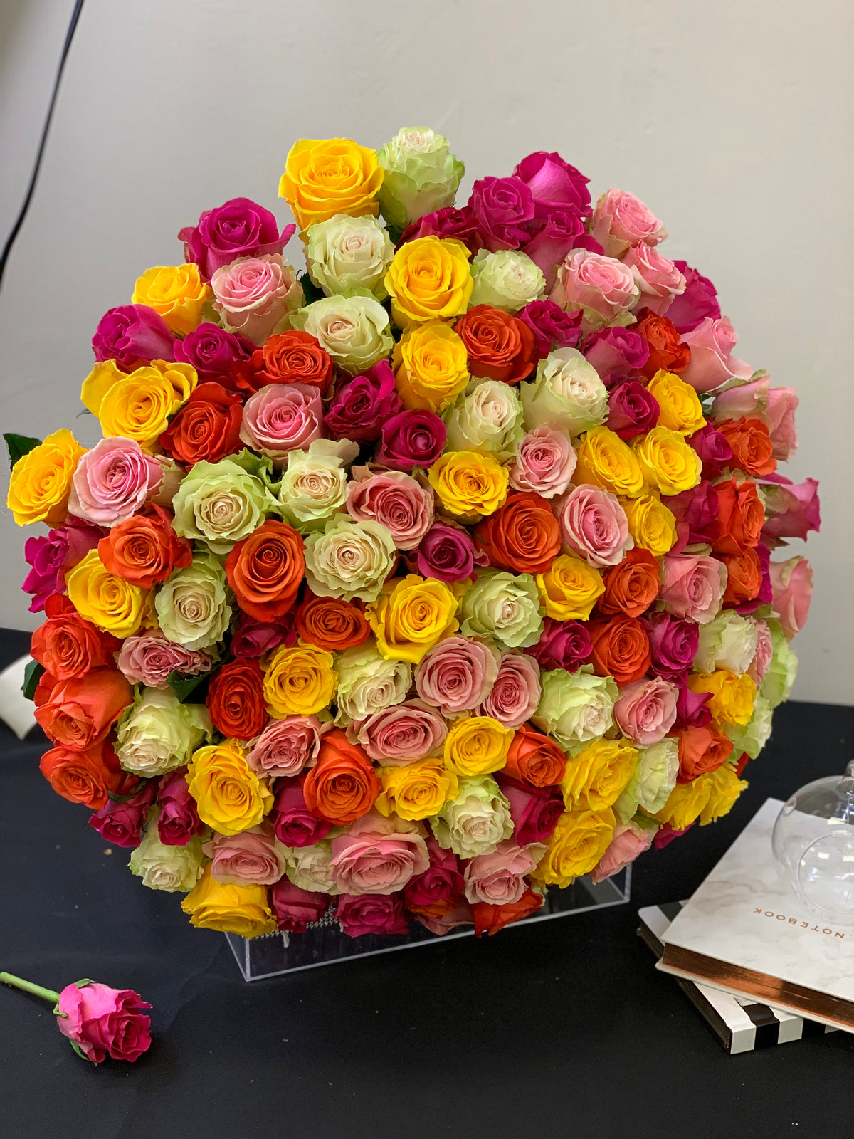 150 assorted roses in colorful handcrafted rainbow rose bouquet