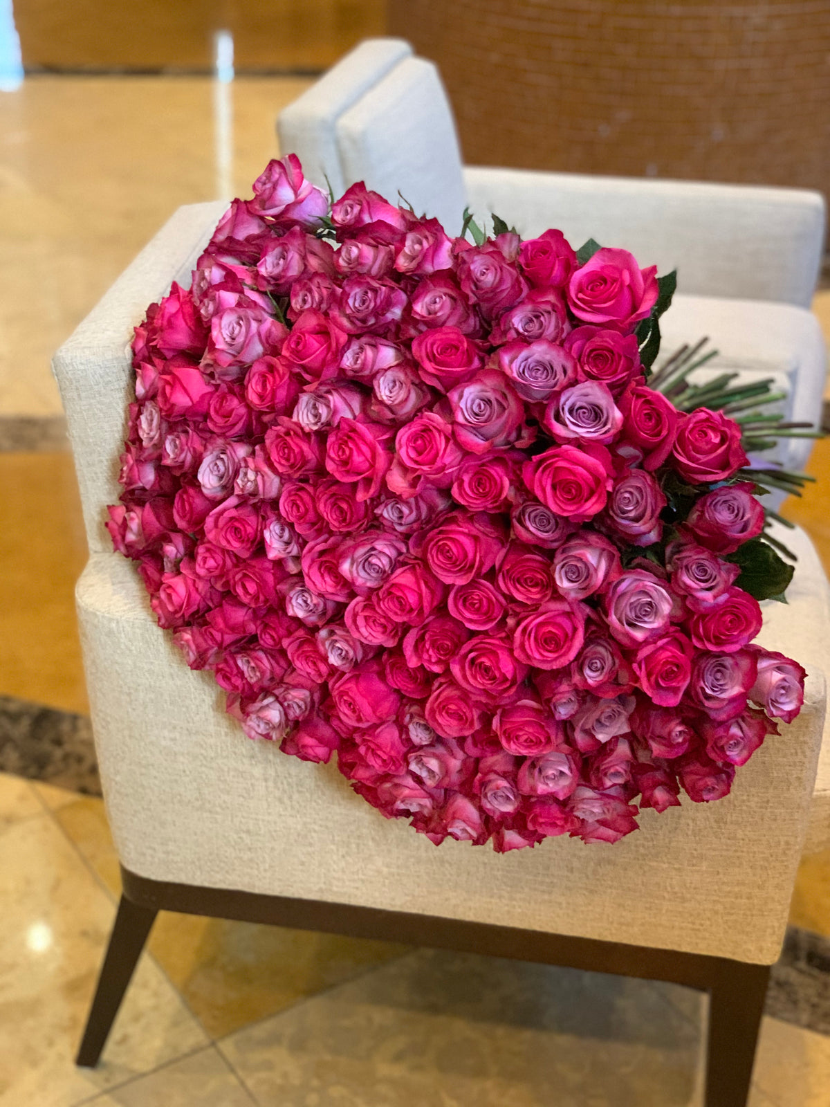 150 hot pink and purple roses luxury bouquet Miami