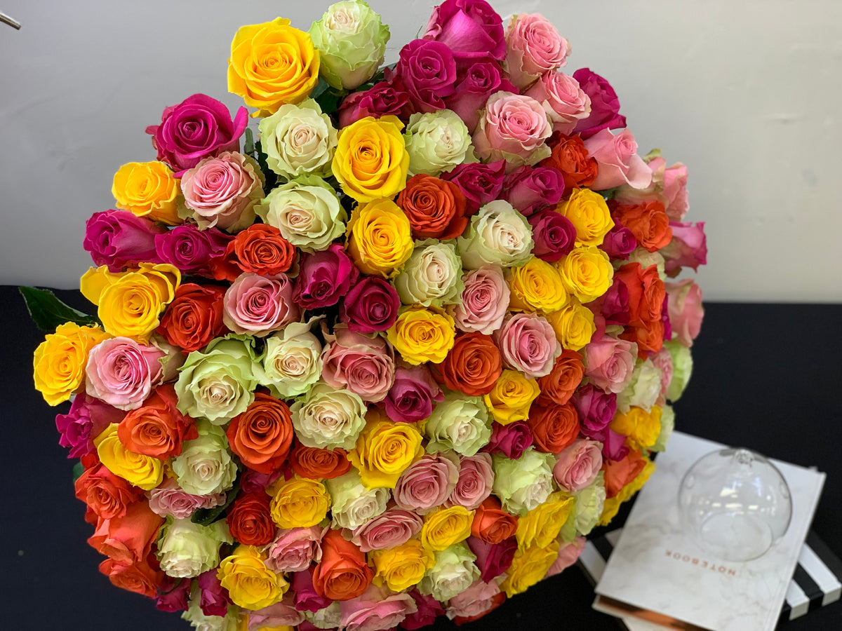 150 mixed color roses handcrafted by Luxury Flowers Miami