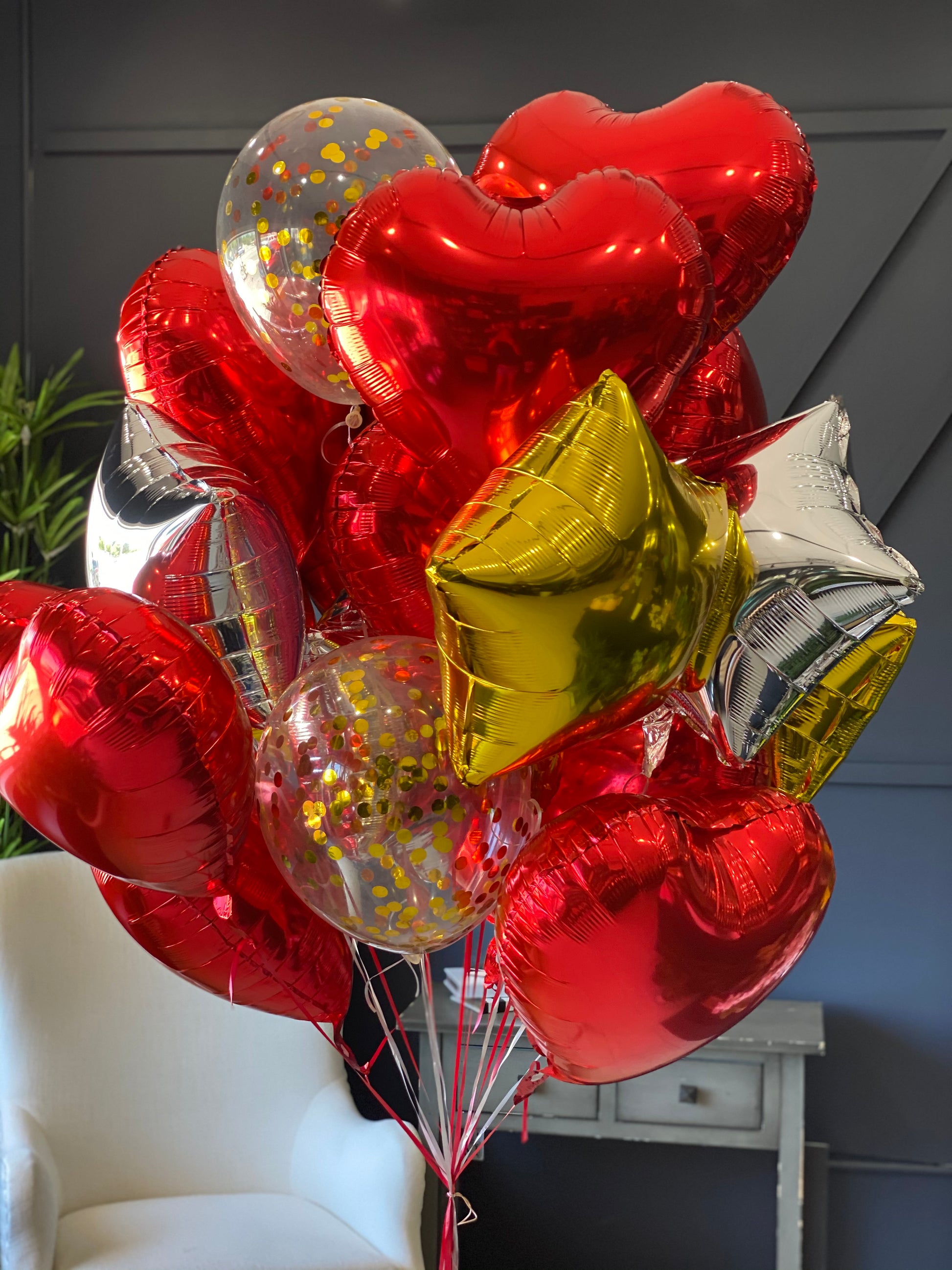 24 red gold silver and clear foil and latex balloon bouquet in Miami