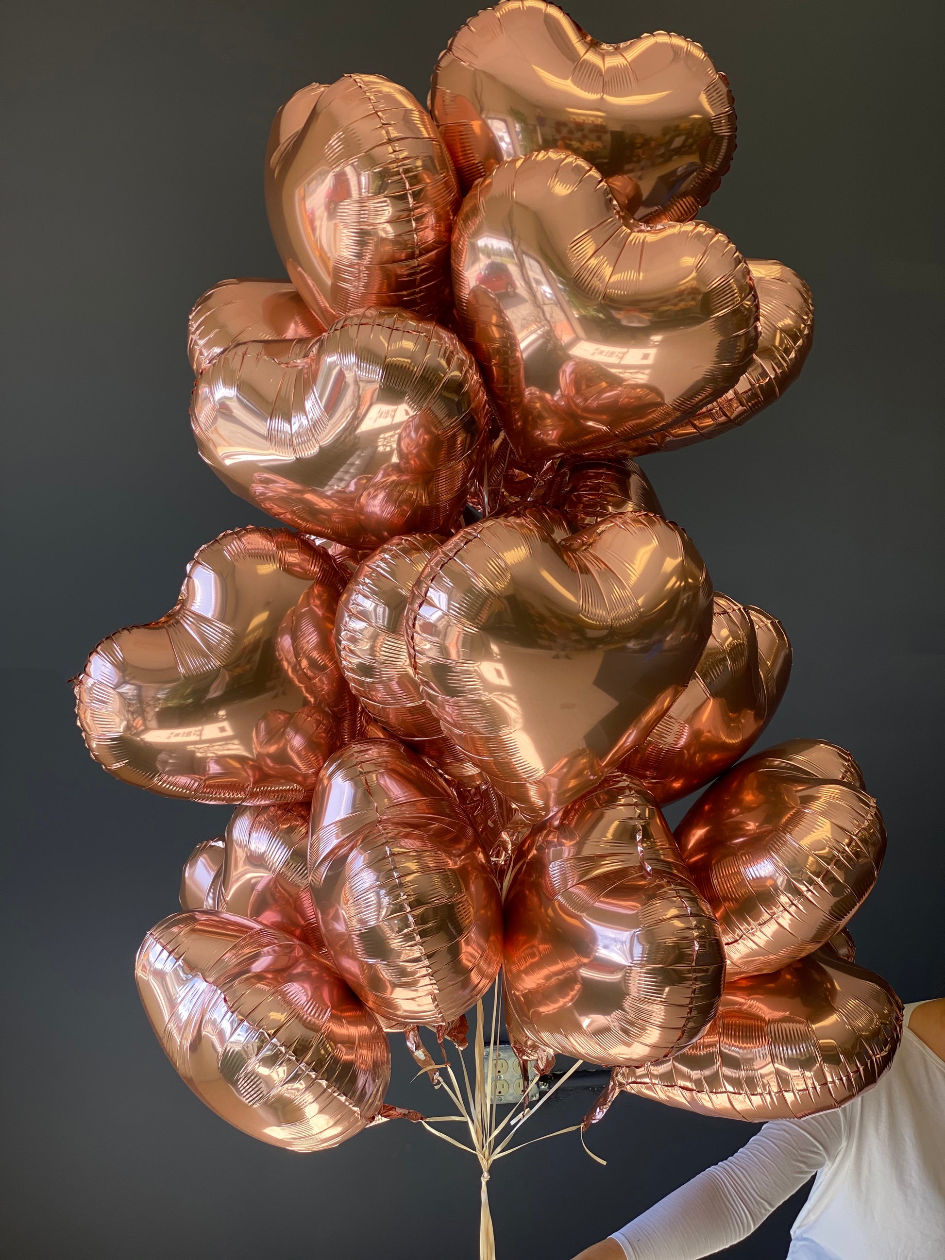 24 rose gold balloons bouquet for delivery in Miami
