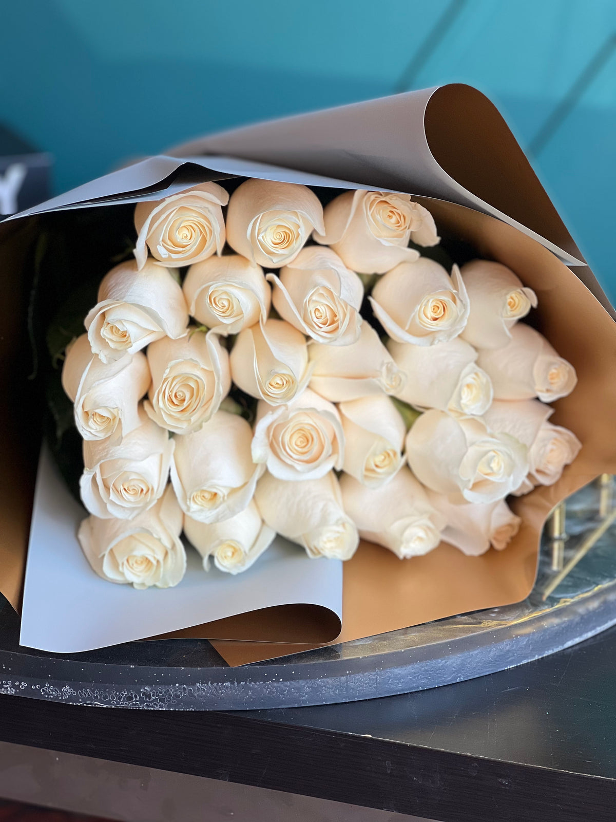 24 white roses elegant wrapped bouquet for Miami delivery