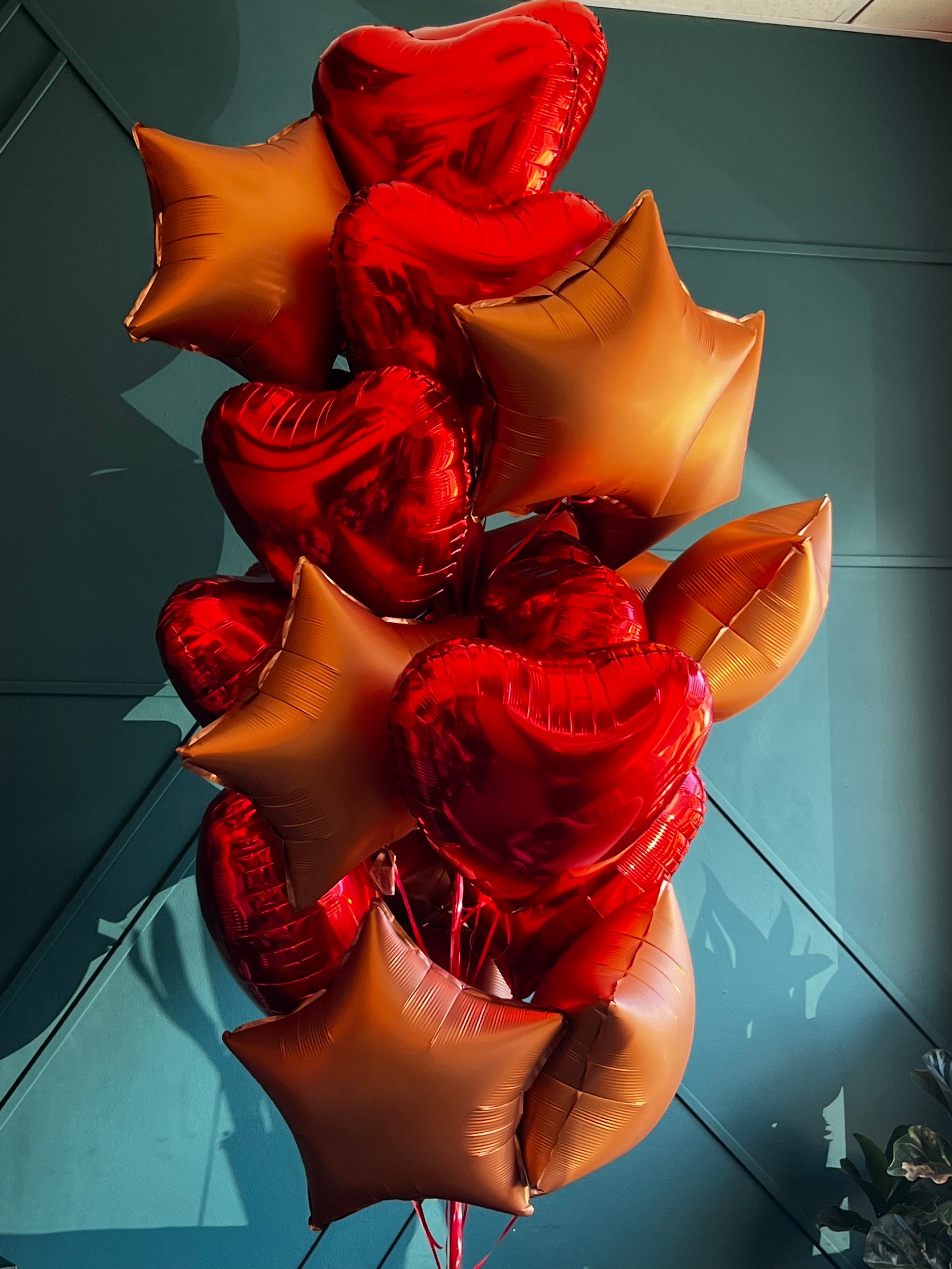 2 dozen red and bronze balloon bouquet for delivery in Miami