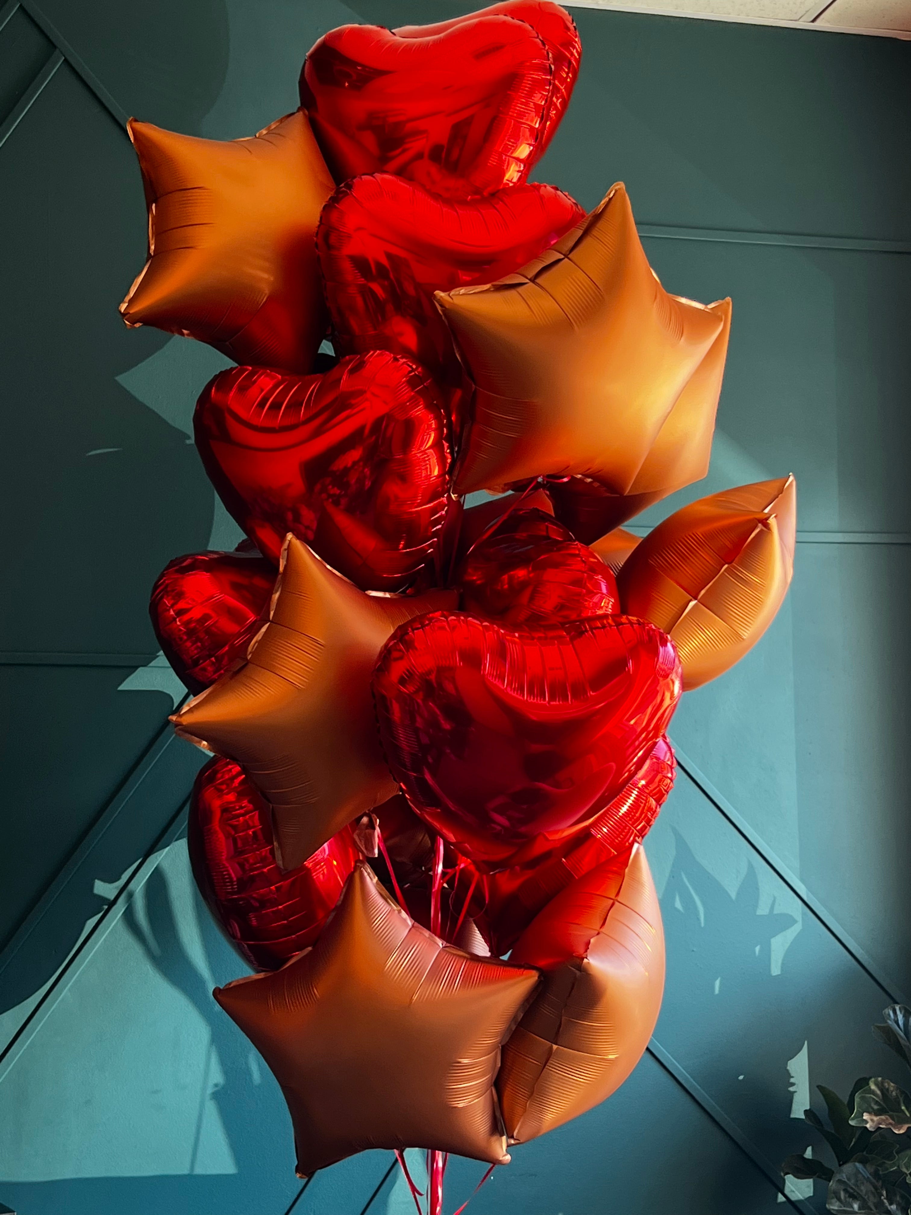 2 dozen red and bronze balloon bouquet for delivery in Miami