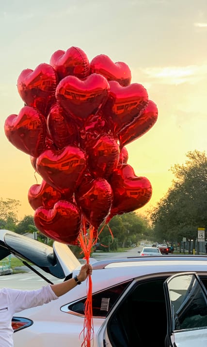 2 dozen red heart balloon bouquet for romantic delivery by Luxury Flowers Miami