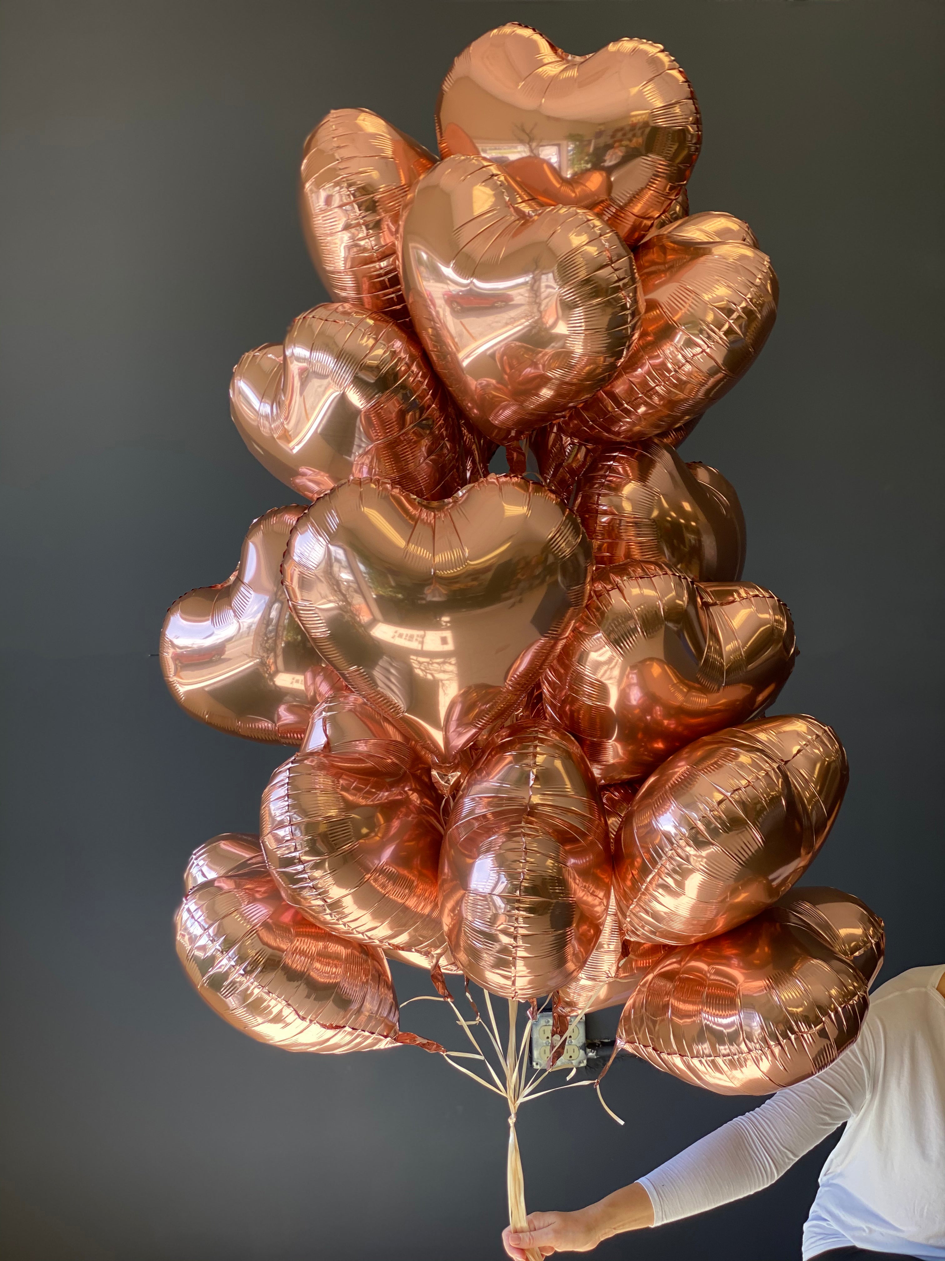 2 dozen rose gold heart foil balloon bouquet by Luxury Flowers Miami