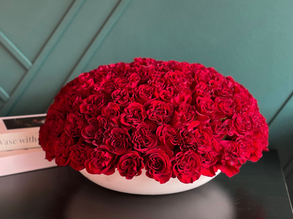 150 Red Roses In A Cement Bowl