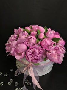 36 pink peonies arranged in an elegant white box