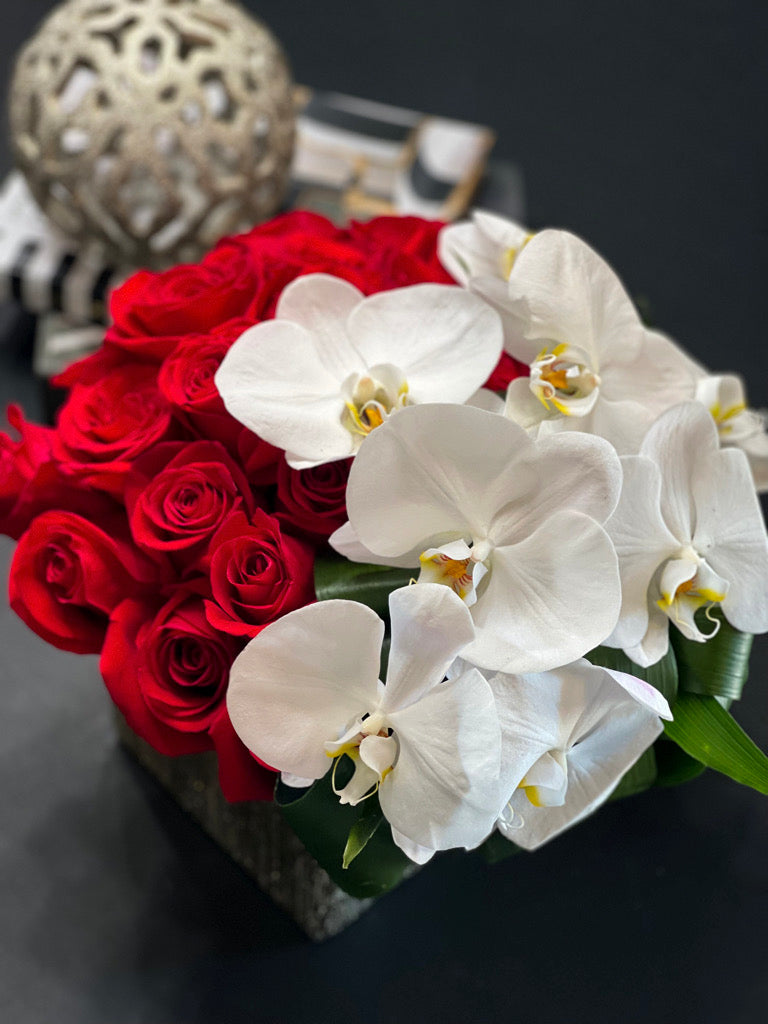 36 red roses and white Phalaenopsis orchids