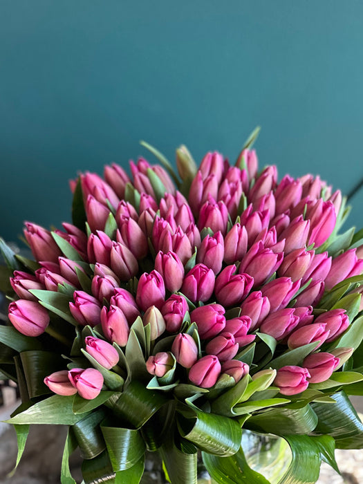 75 Pink Tulips In Fishbowl Clear Vase