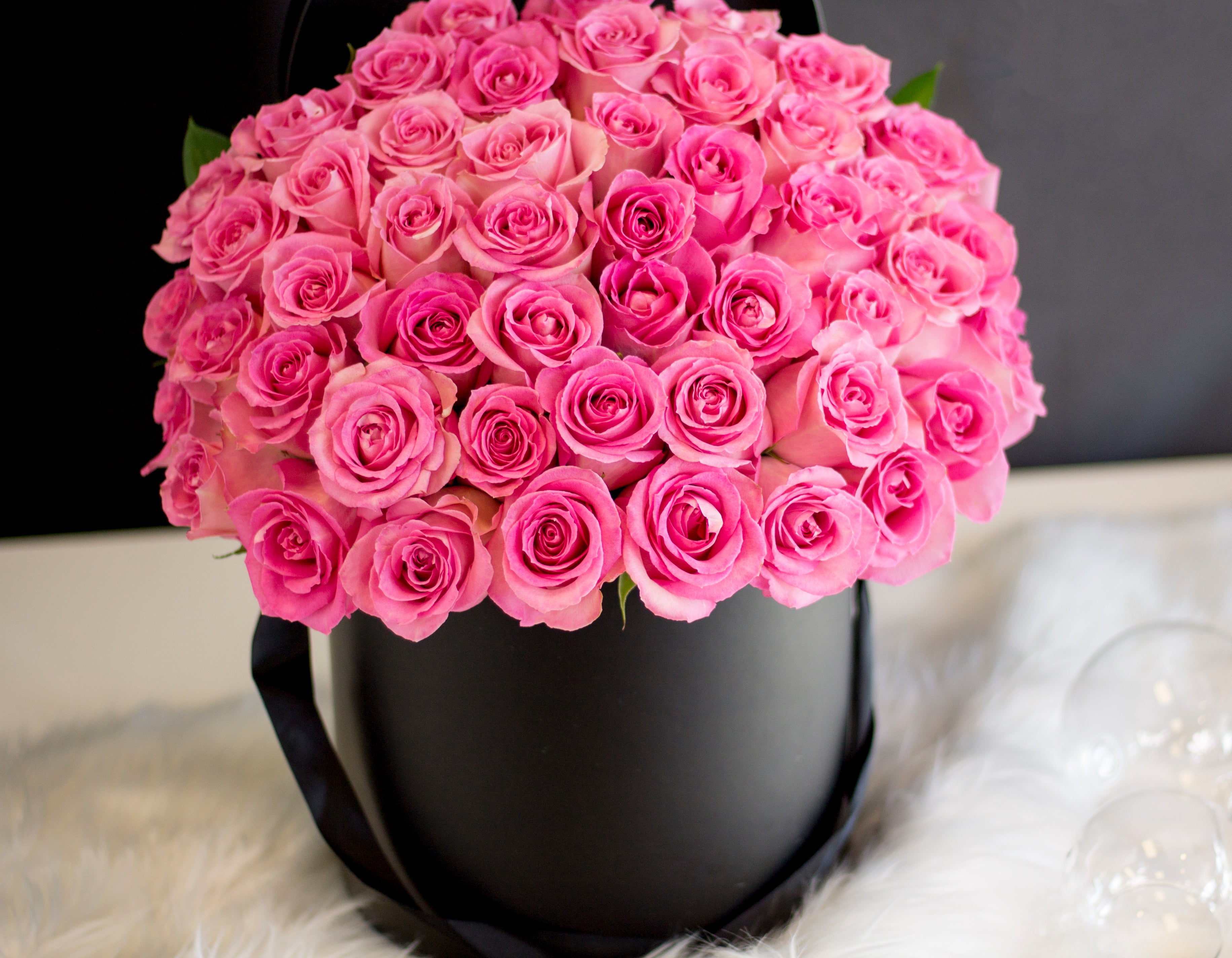 48 pink roses in a luxury round box Miami