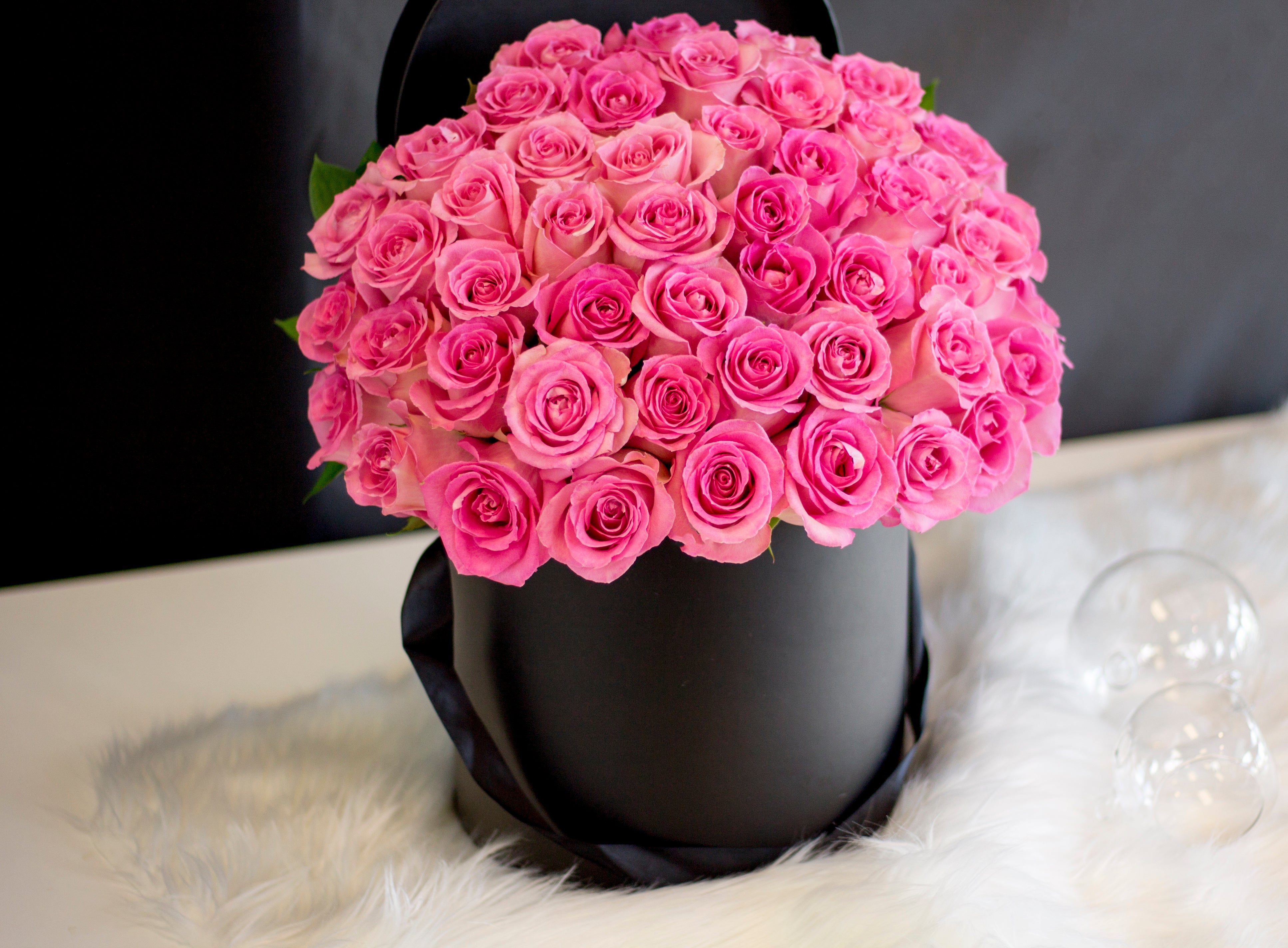 48 premium pink roses in a black flower box