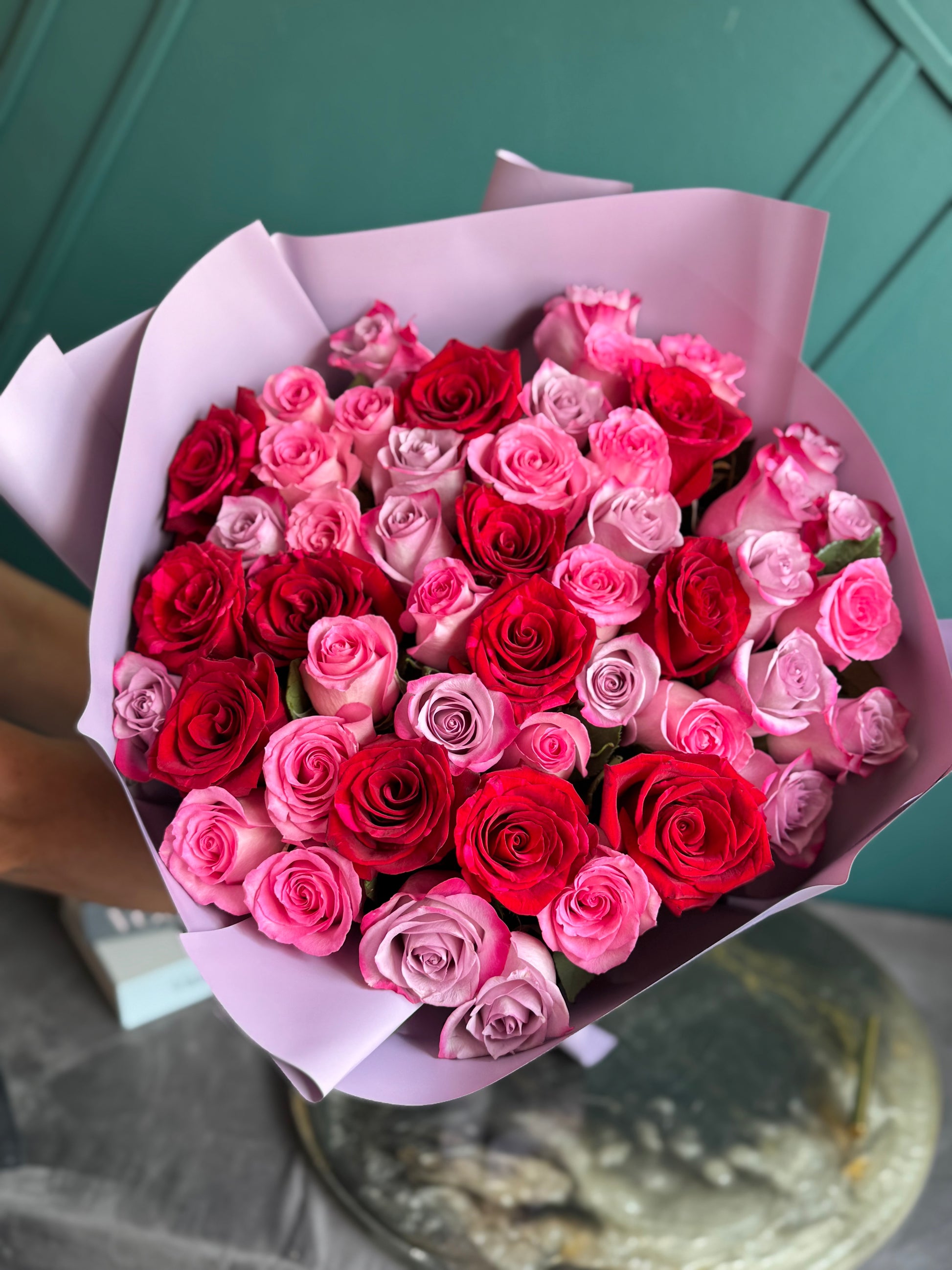 50 assorted roses bouquet with red pink and purple roses