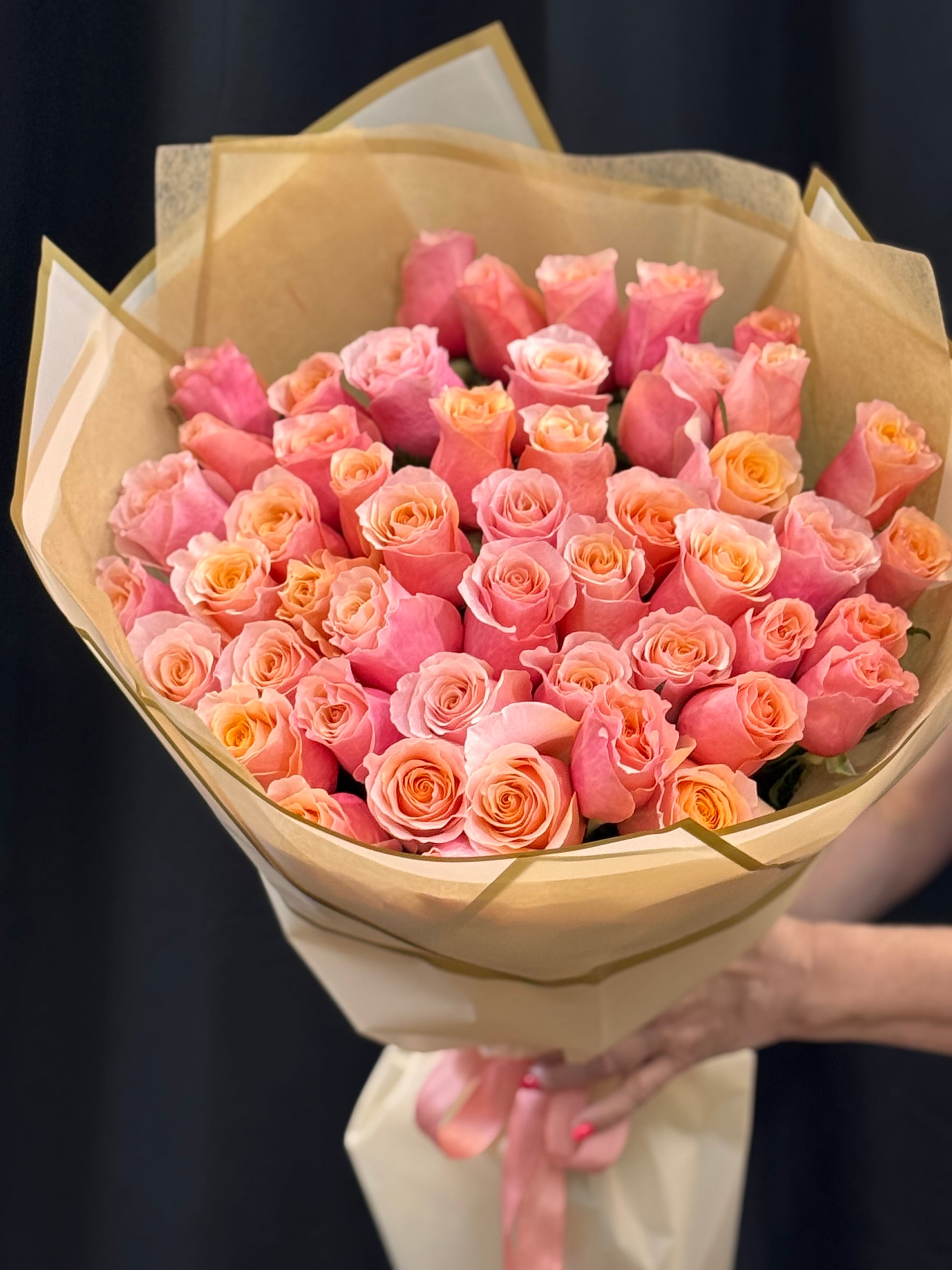 50 pink-peach roses bouquet with soft flamingo tones for Miami delivery