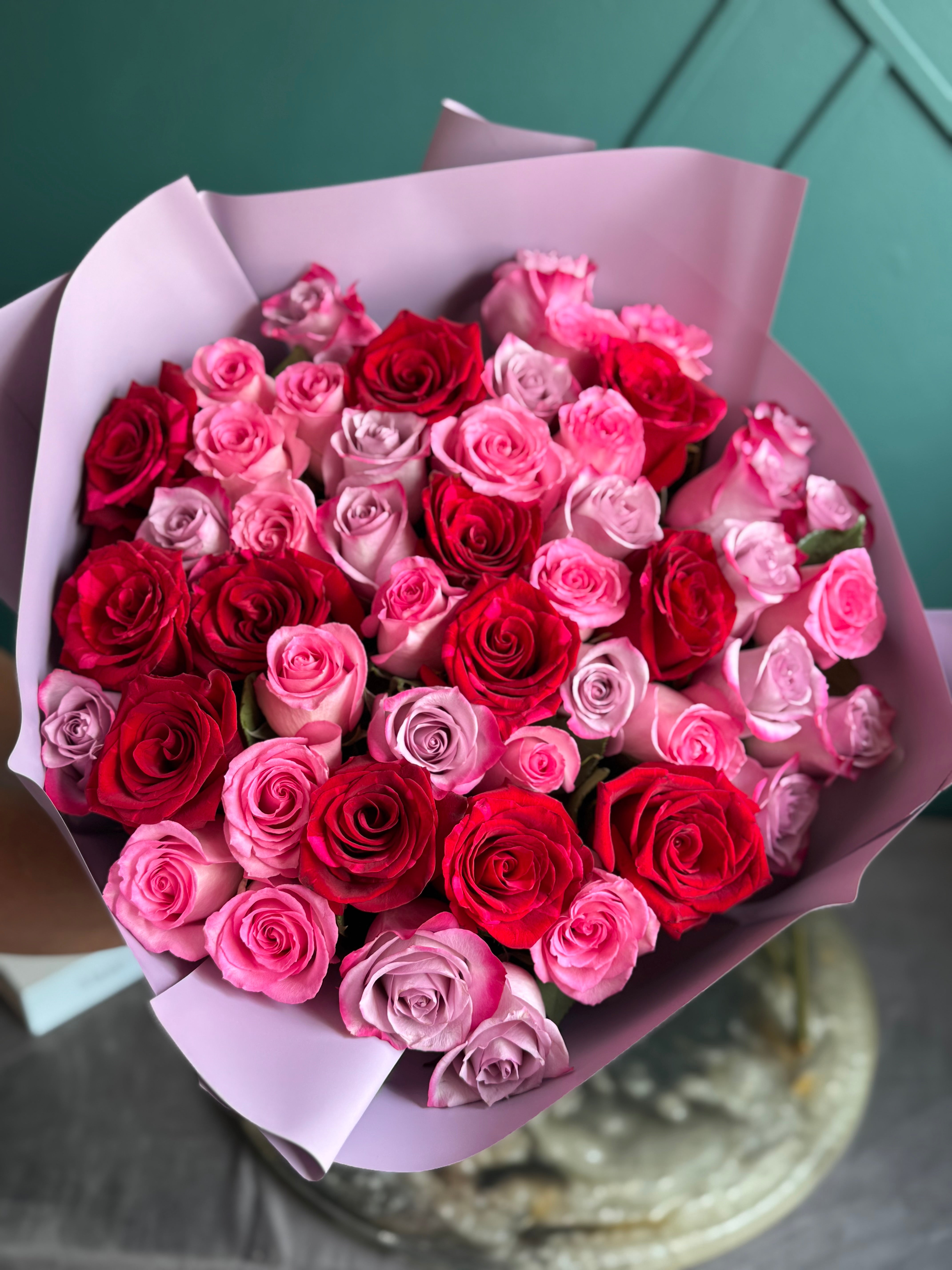 50 premium assorted roses in elegant wrapping