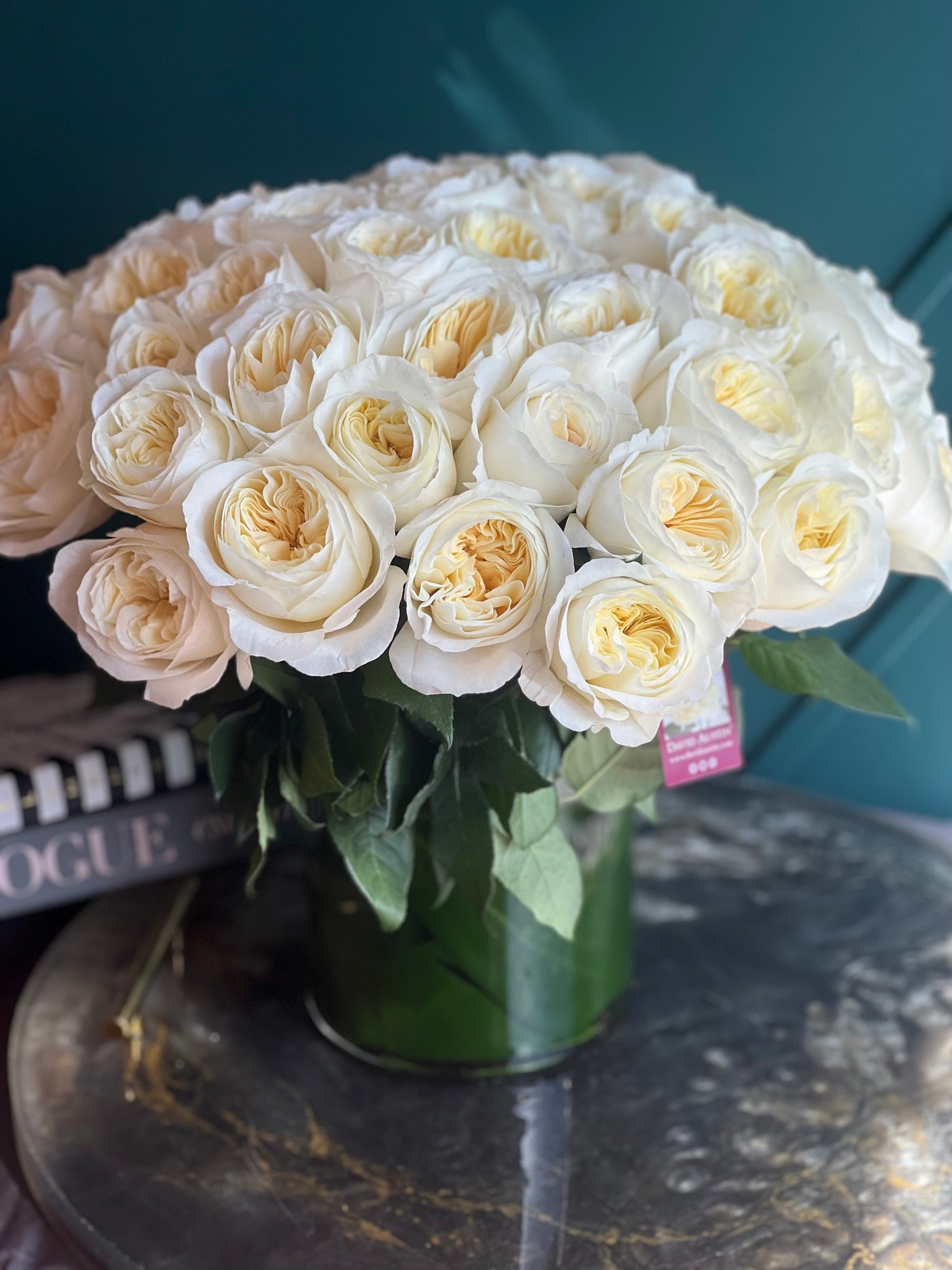 50 premium garden roses arrangement in soft ivory and cream tones