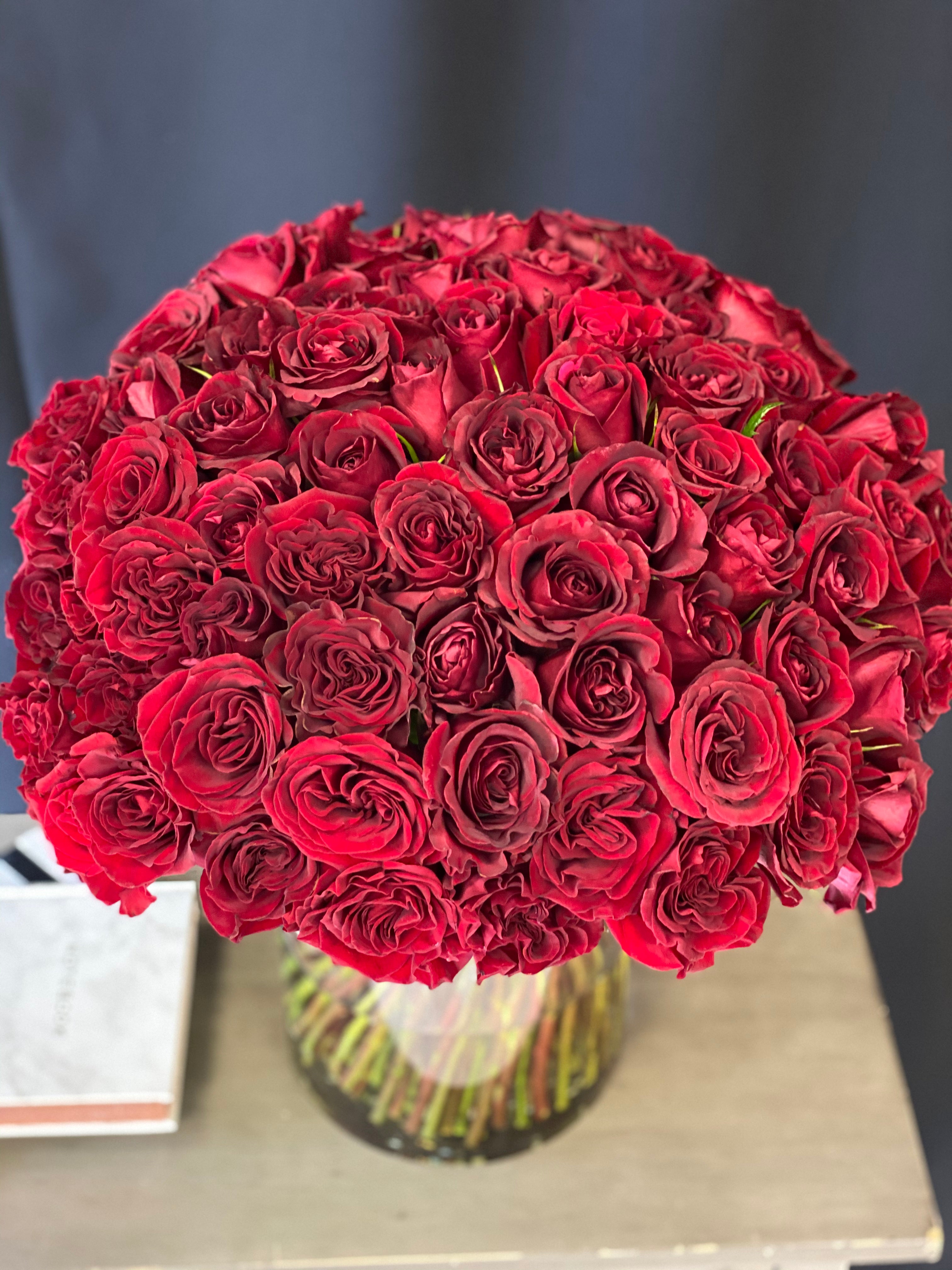 50 red roses in luxury vase arrangement Miami
