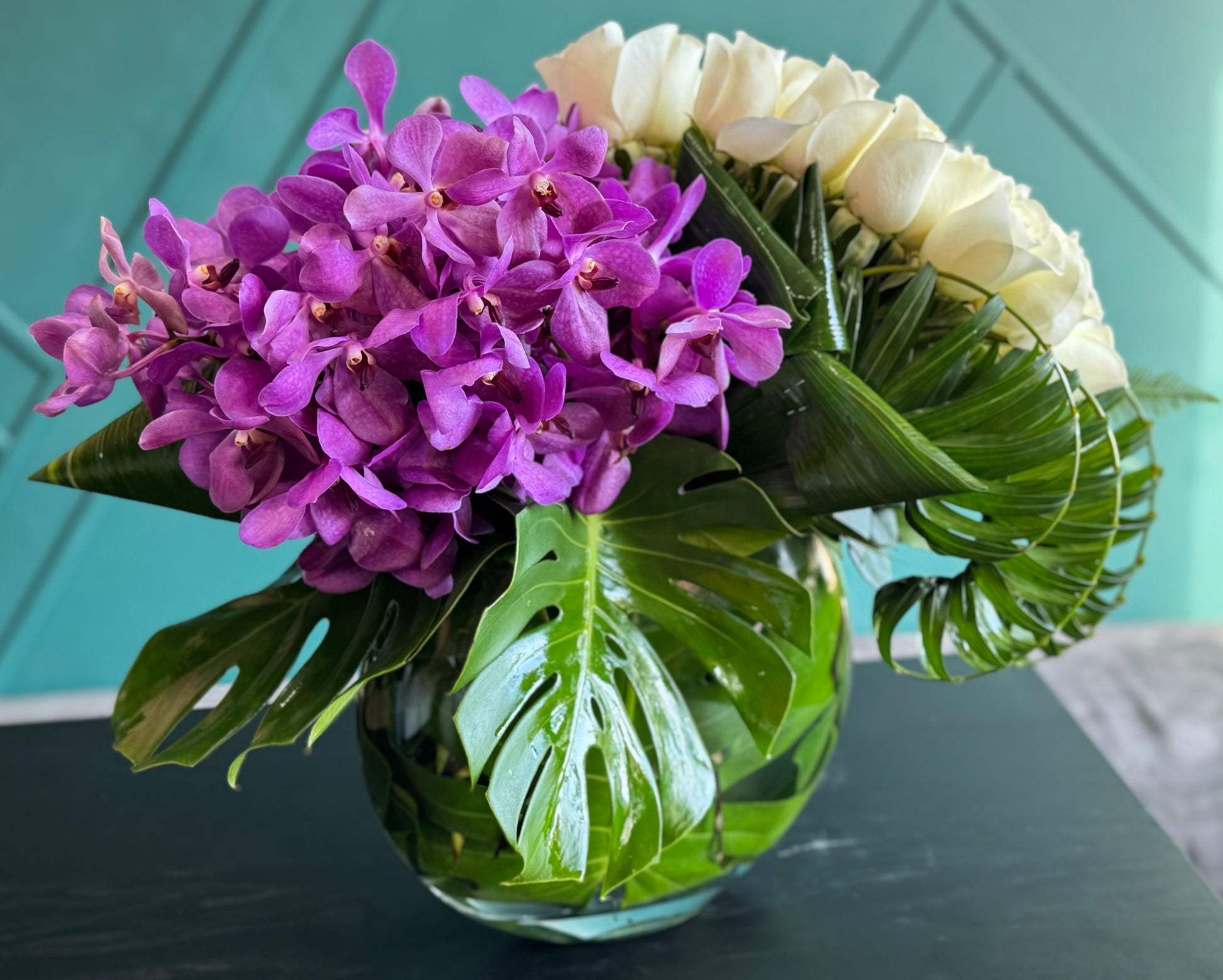 50 white roses and Mokara orchids luxury arrangement in Miami