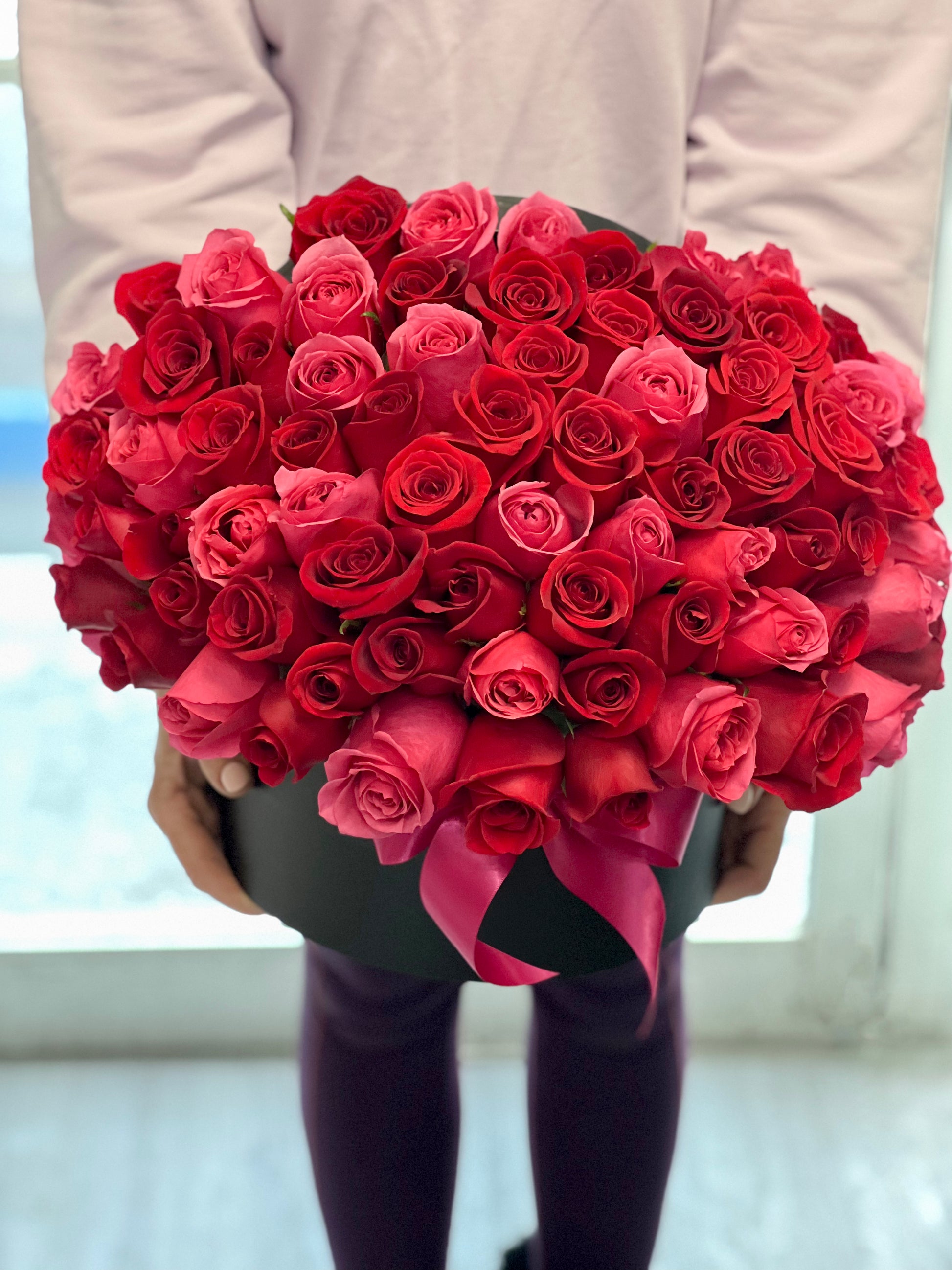 75 red and hot pink roses luxury arrangement Miami