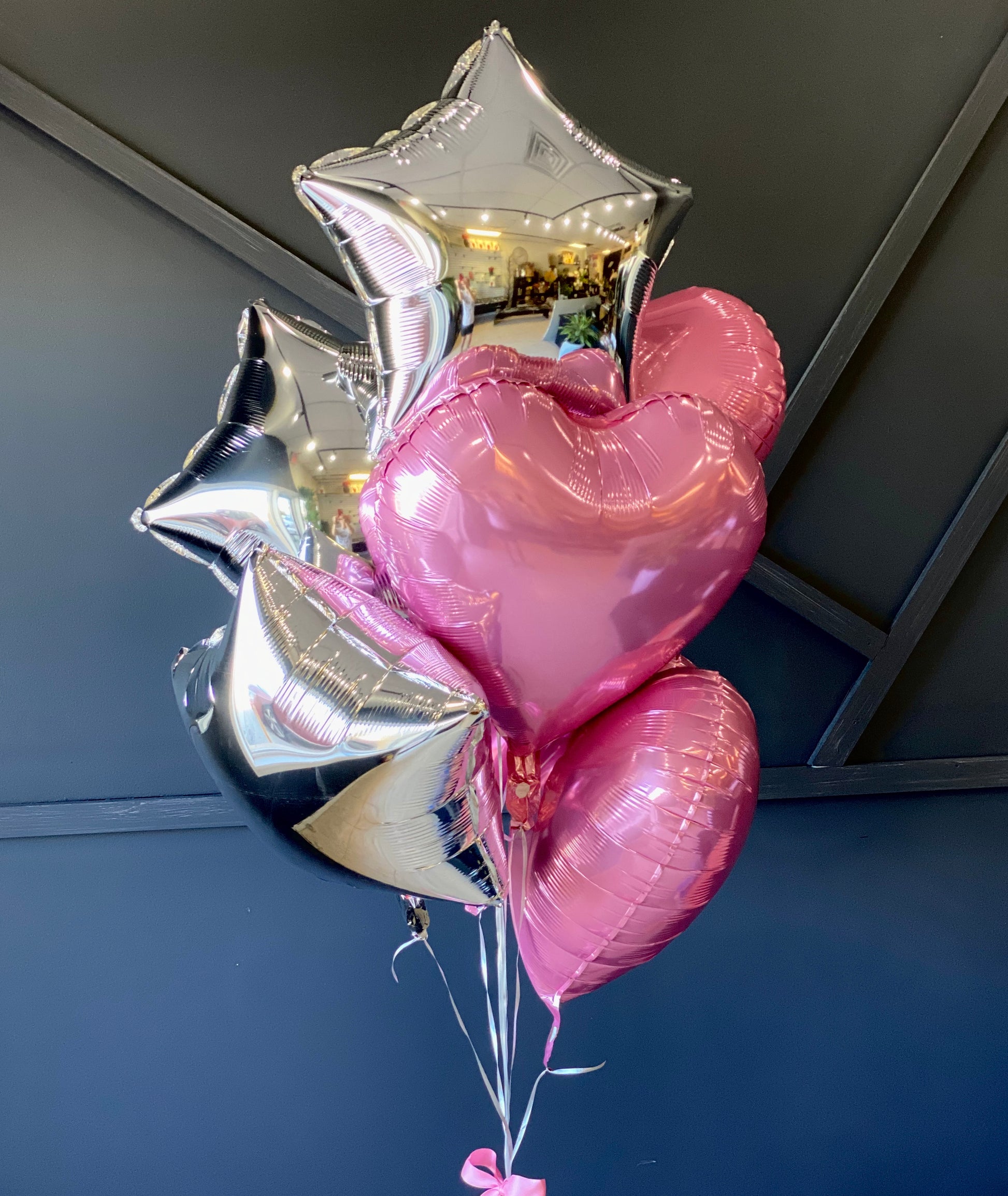 7 light pink and silver balloon bouquet for delivery by Luxury Flowers Miami