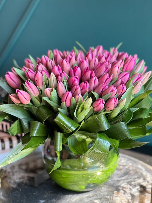 75 Pink Tulips In Fishbowl Clear Vase