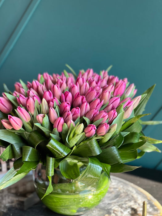 75 Pink Tulips In Fishbowl Clear Vase