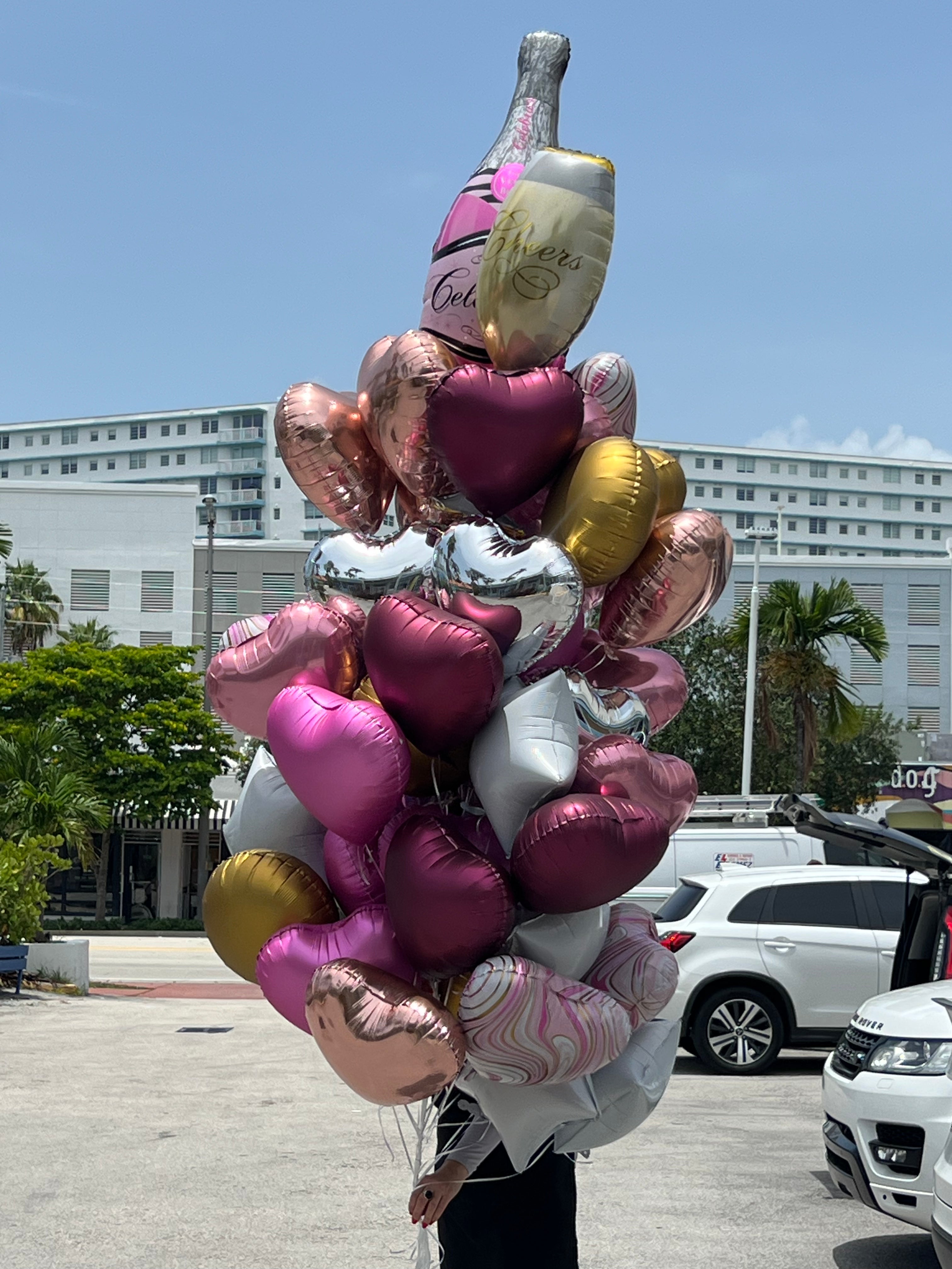 Assorted helium birthday balloon bouquet by Luxury Flowers Miami