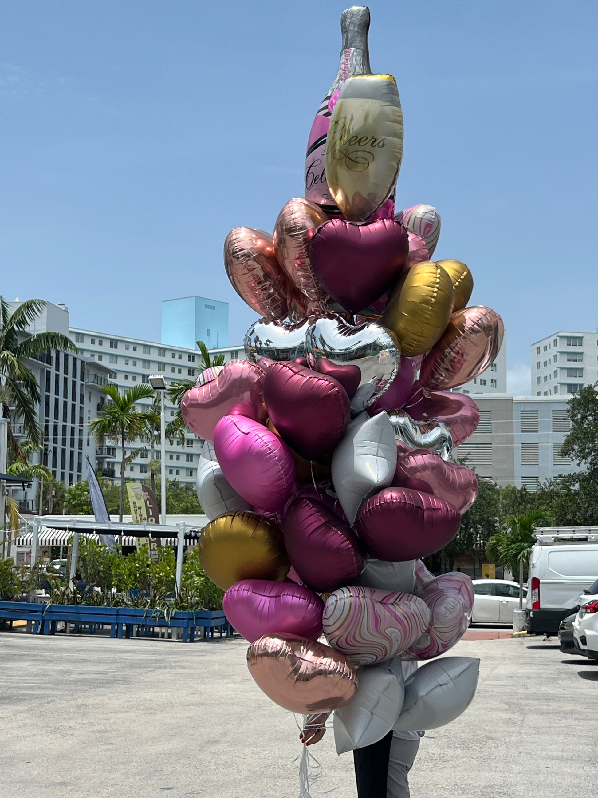 Assorted pink gold and metallic birthday balloons Miami