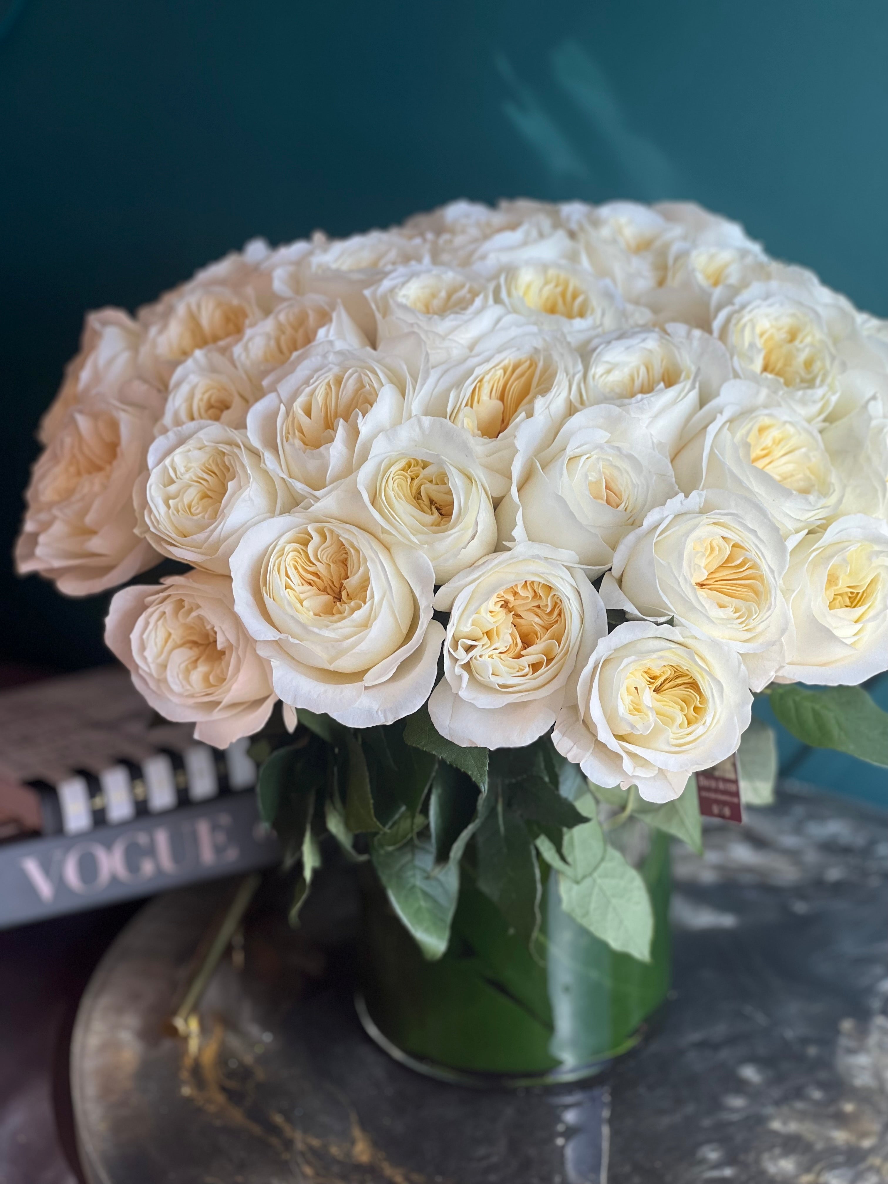Beautiful garden roses with full layered petals in a luxury arrangement