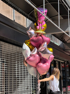 Birthday balloon arrangement with different size balloons in Miami