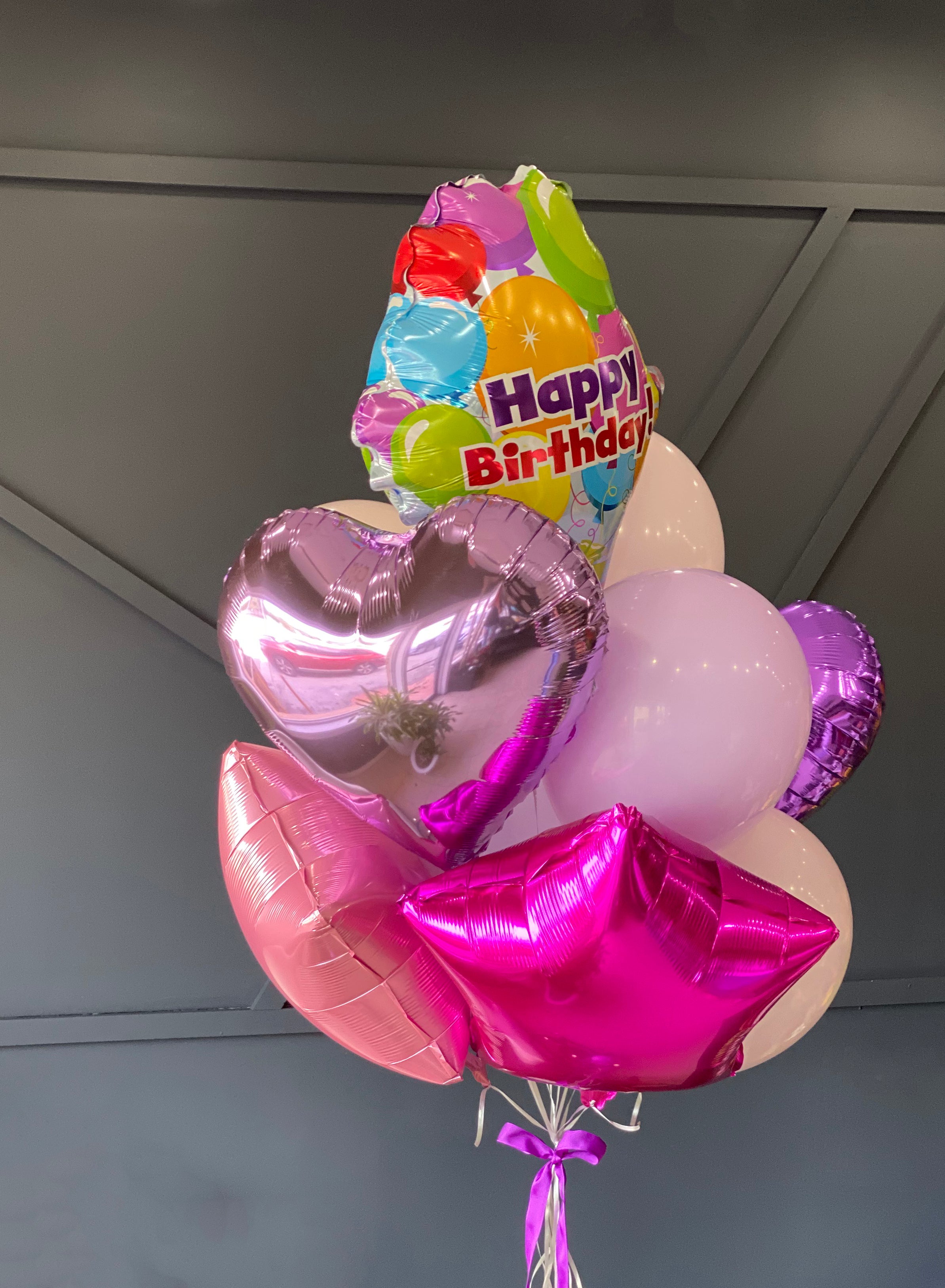 Birthday balloon bouquet with foil and latex balloons by Luxury Flowers Miami