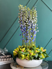 Blue delphinium and green cymbidium orchid arrangement Miami
