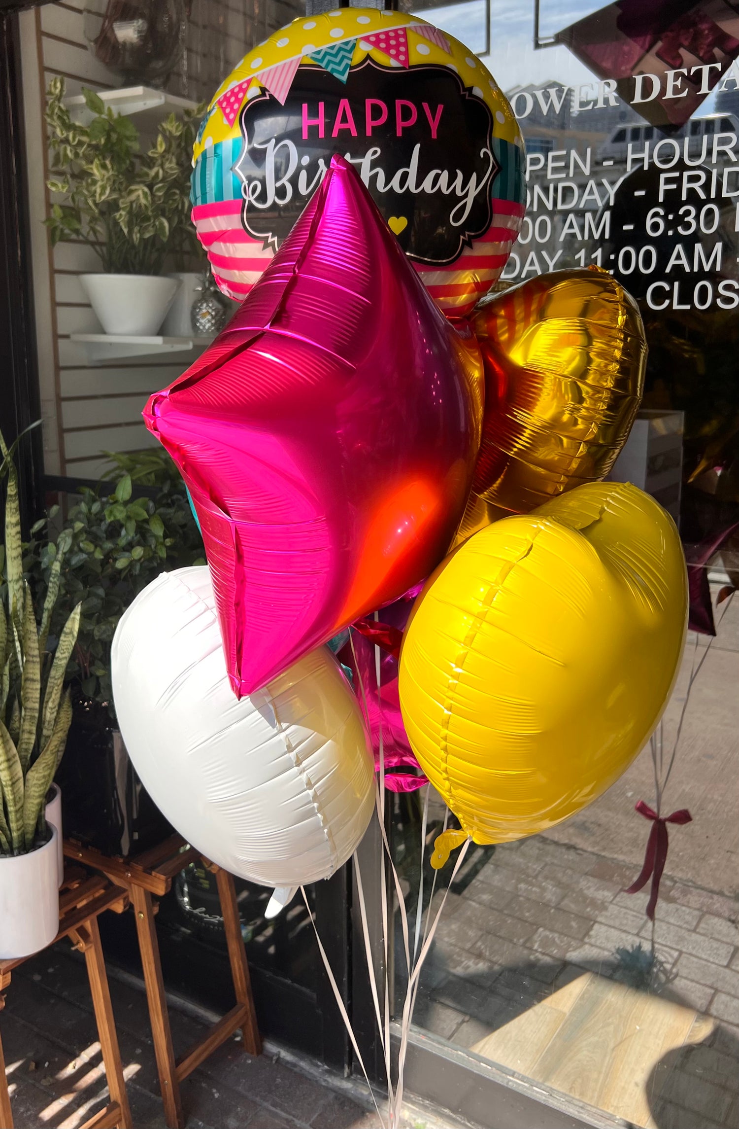 Bright Happy Birthday balloons for party delivery in Miami