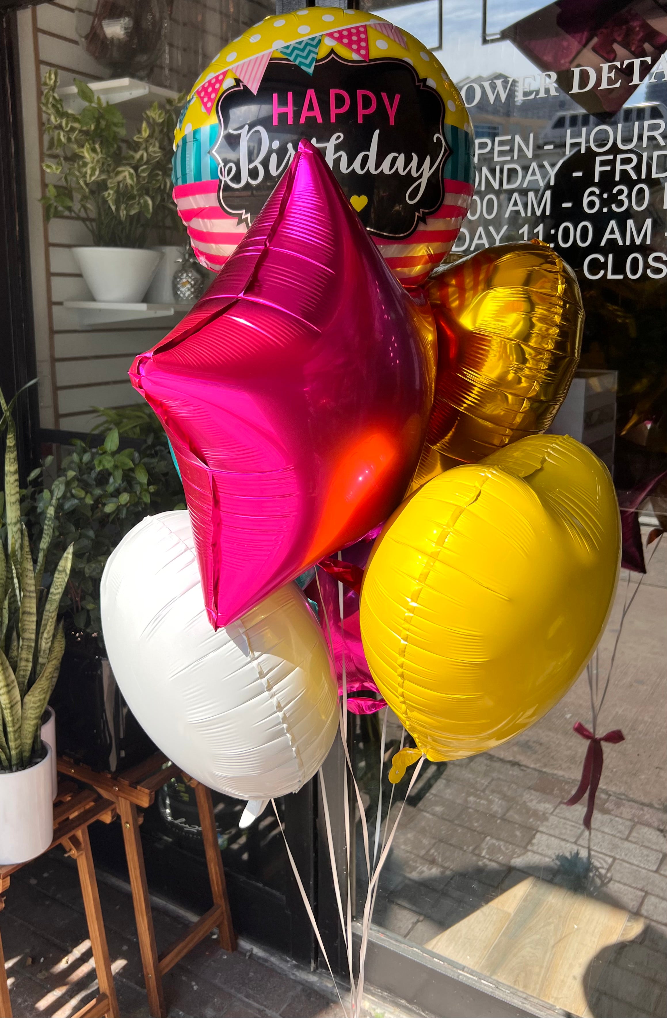 Bright Happy Birthday balloons for party delivery in Miami