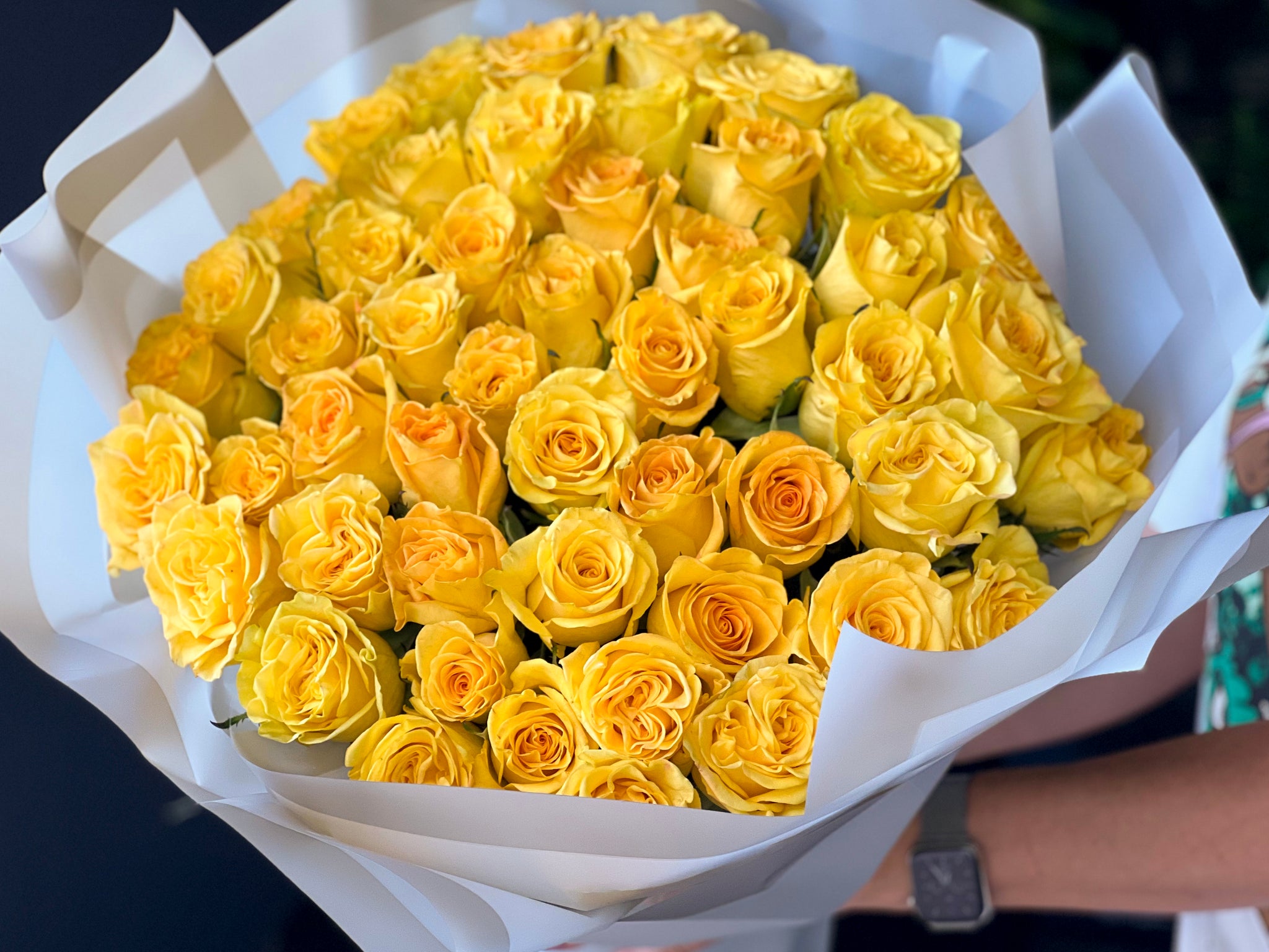 Bright bouquet of 50 yellow roses for flower delivery in Miami
