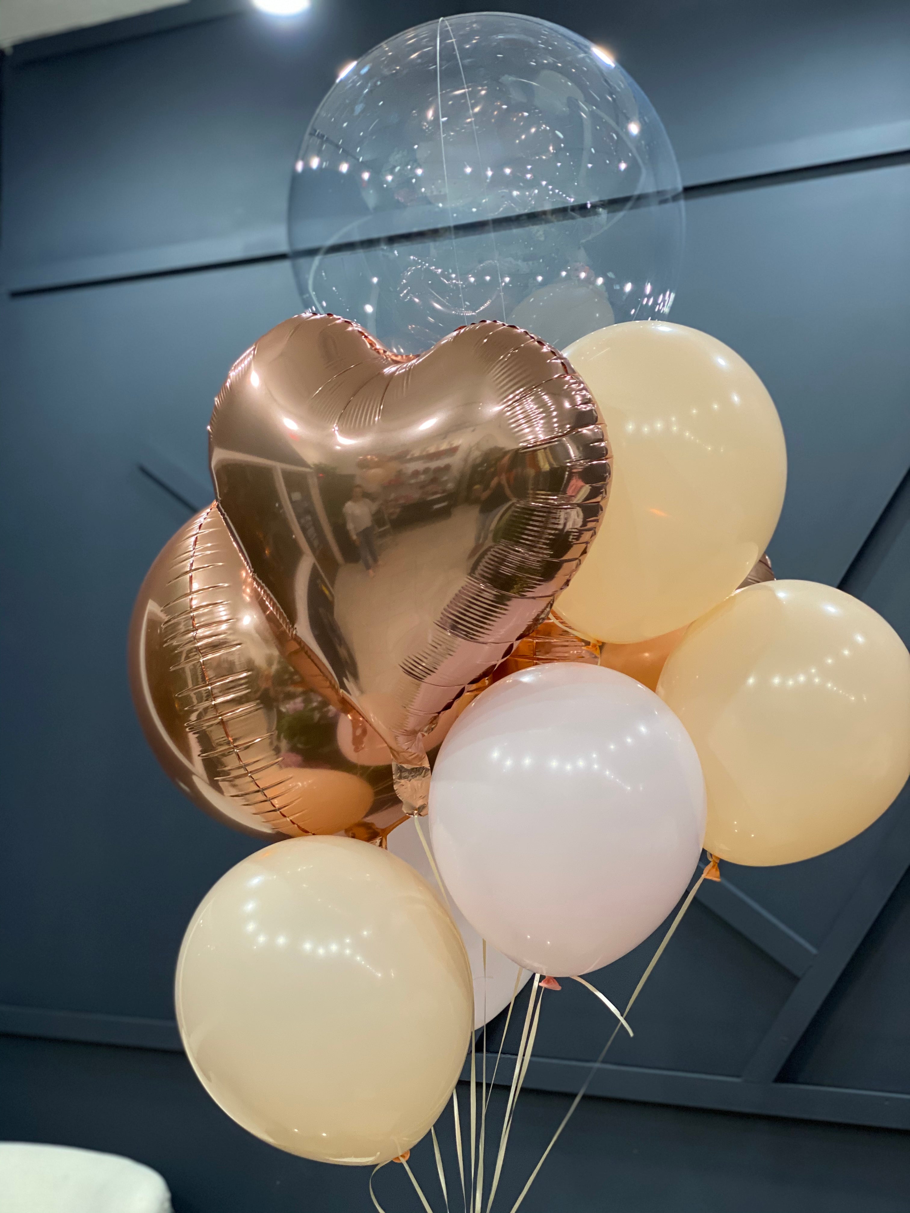 Champagne and gold balloon bouquet for party delivery in Miami