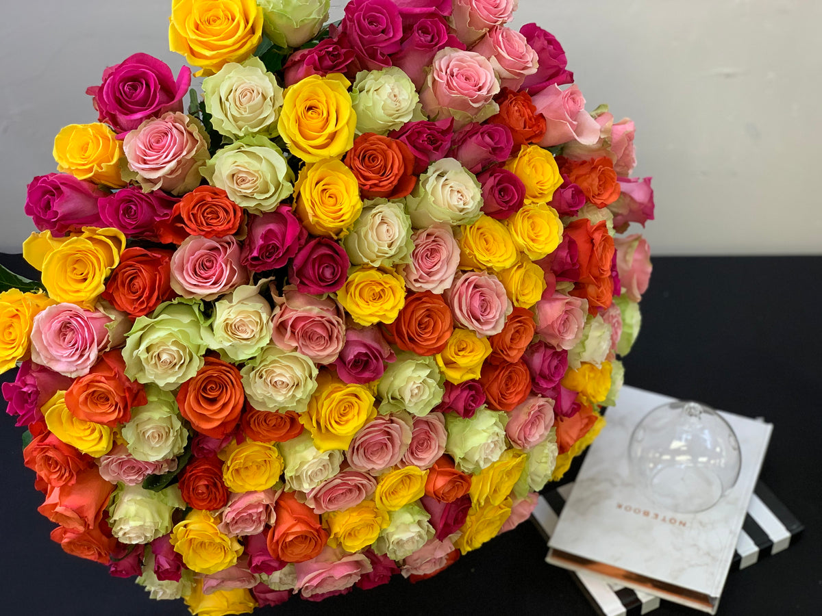 Colorful 150 rose bouquet with assorted rainbow colors