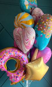 Colorful balloon bouquet for sweet sixteen and kids parties