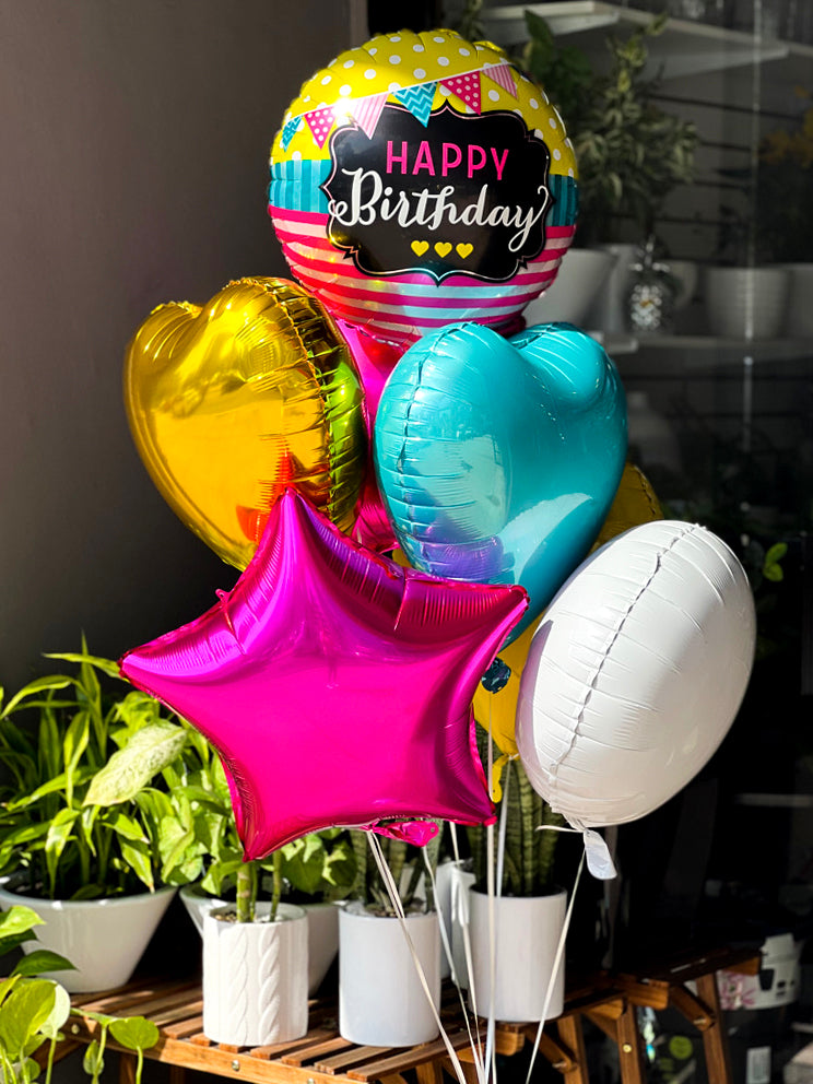 Colorful birthday balloon bouquet arranged by Luxury Flowers Miami