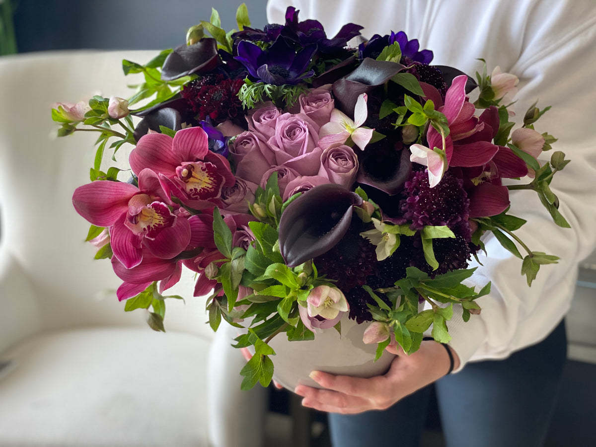 Contemporary purple floral arrangement Miami