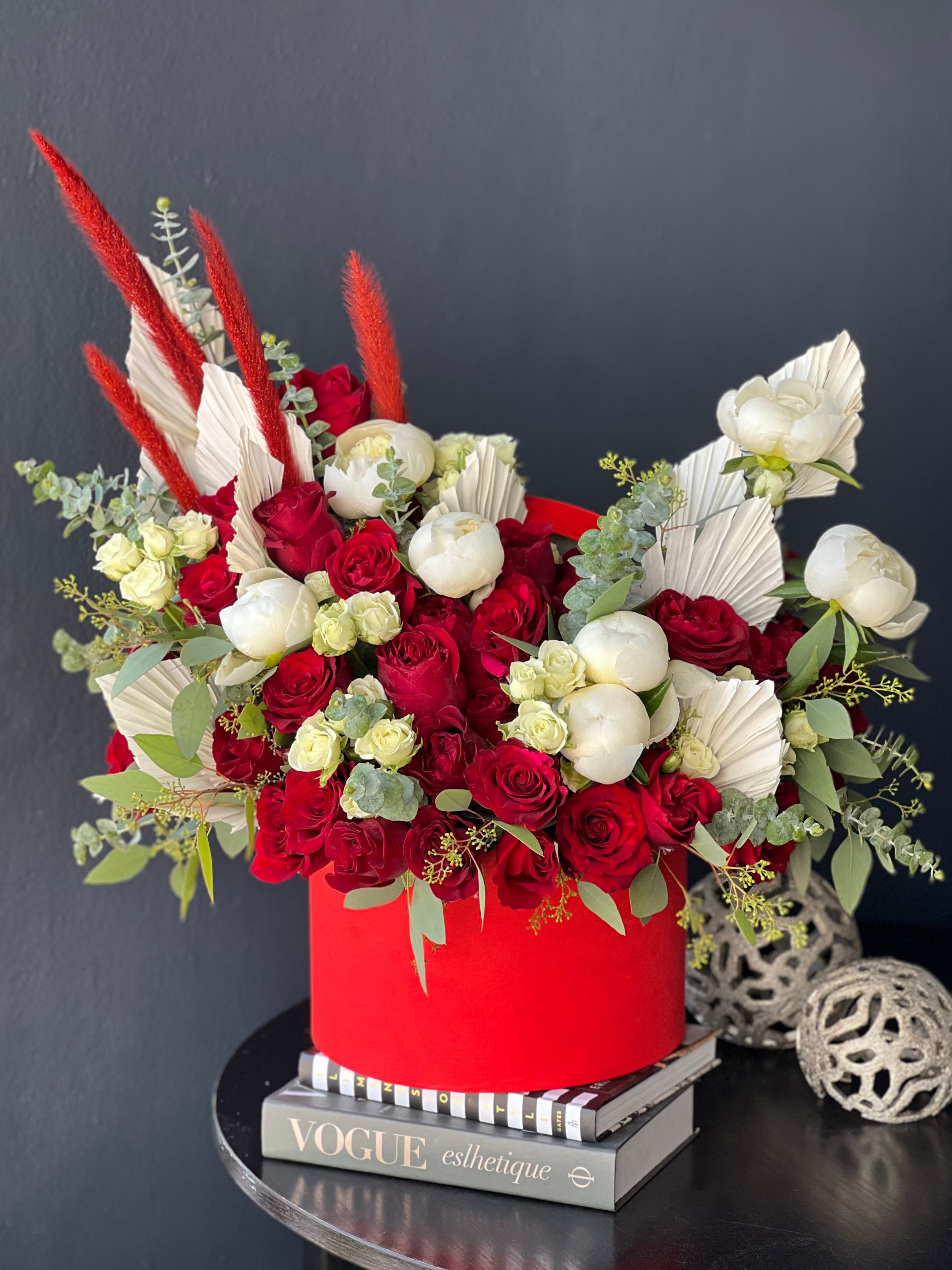 Contemporary red rose and white peony arrangement Miami florist