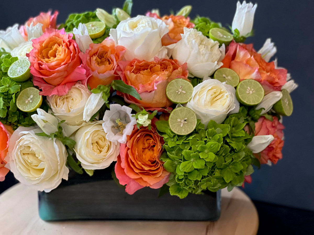 Coral peach and ivory flower arrangement for Miami delivery