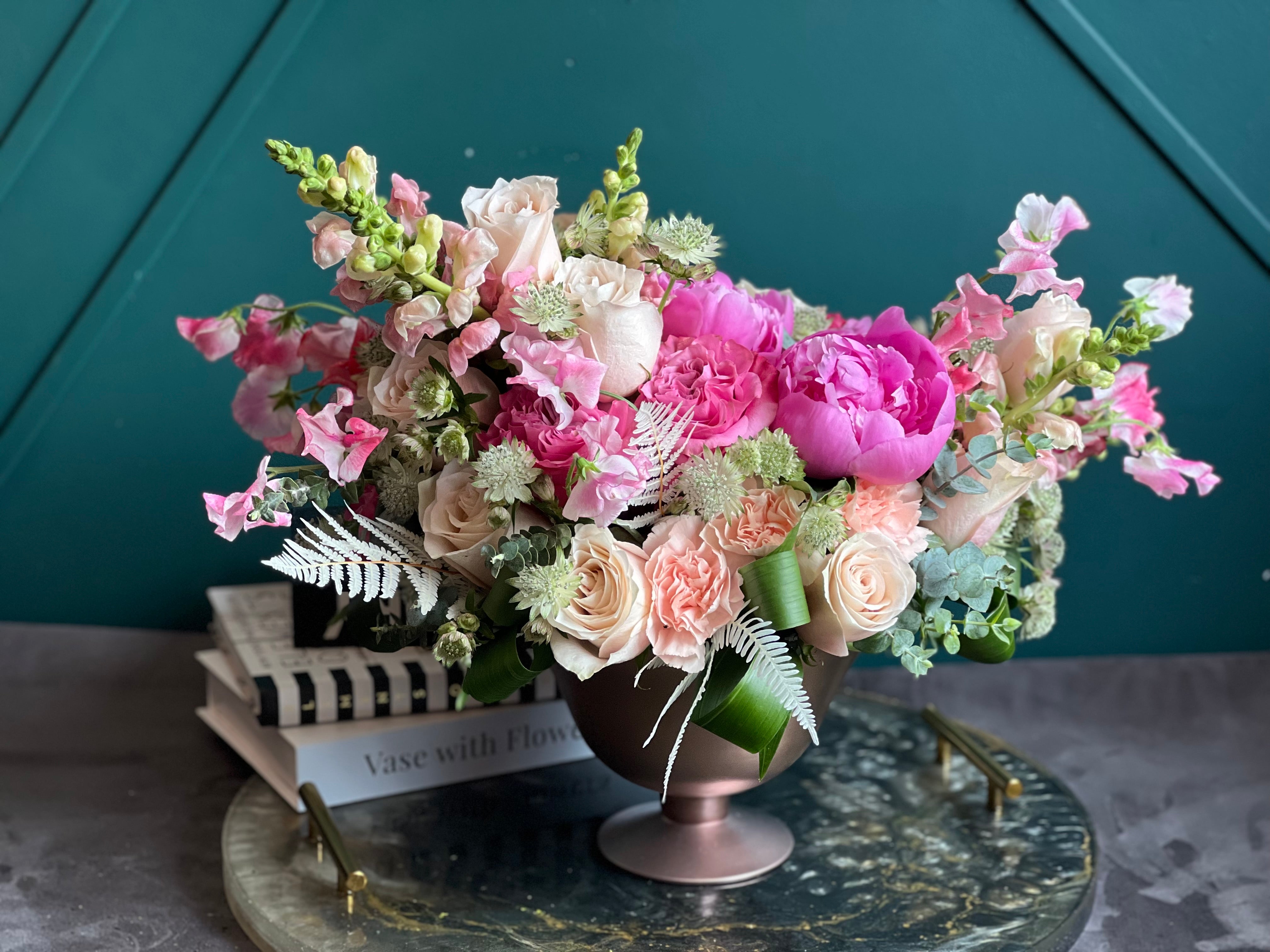 Couture-inspired peony and garden rose centerpiece